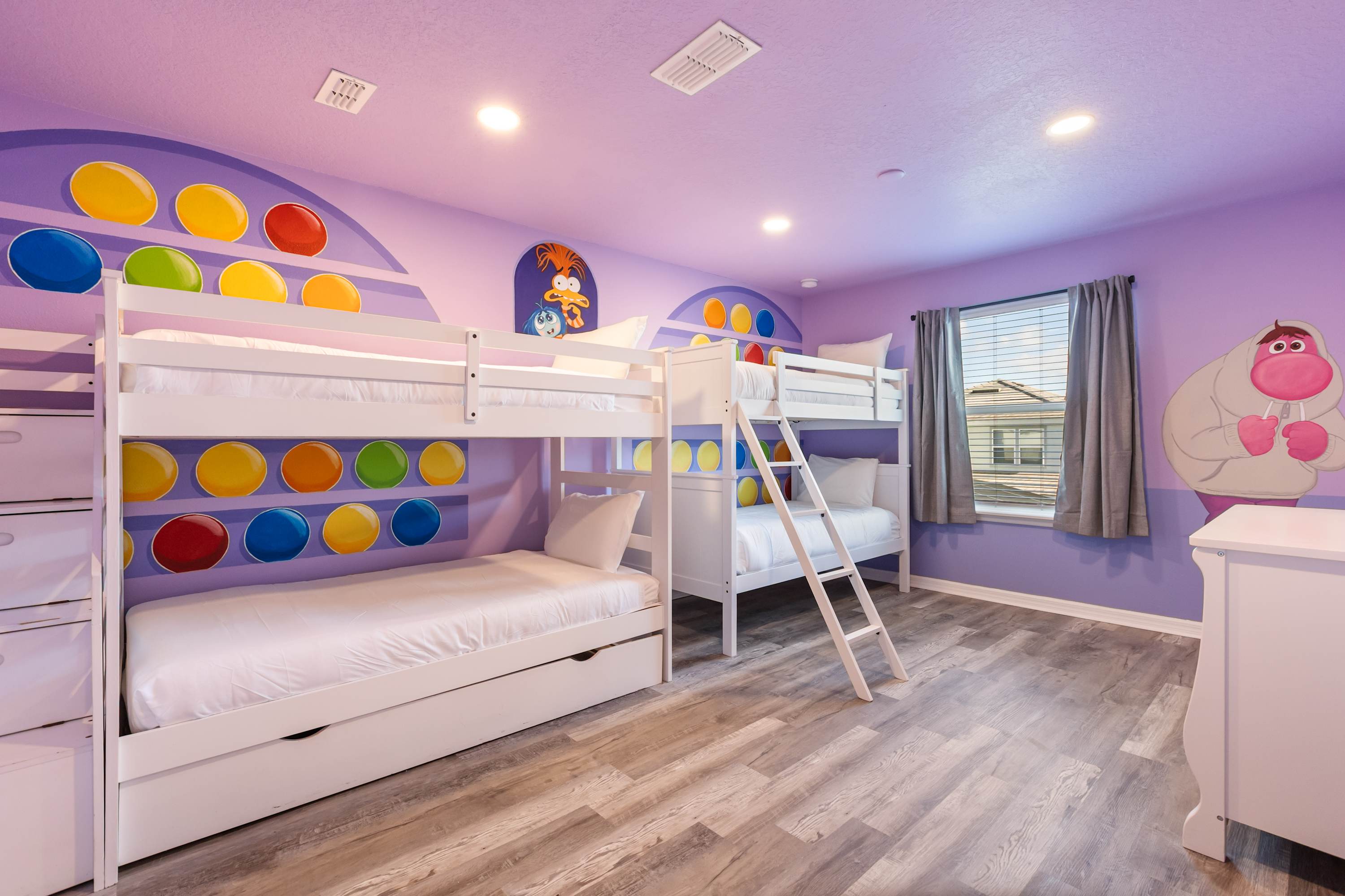 Bedroom 3 – Disney inside-out themed bunk room with two twin bunk beds—perfect for kids or groups.