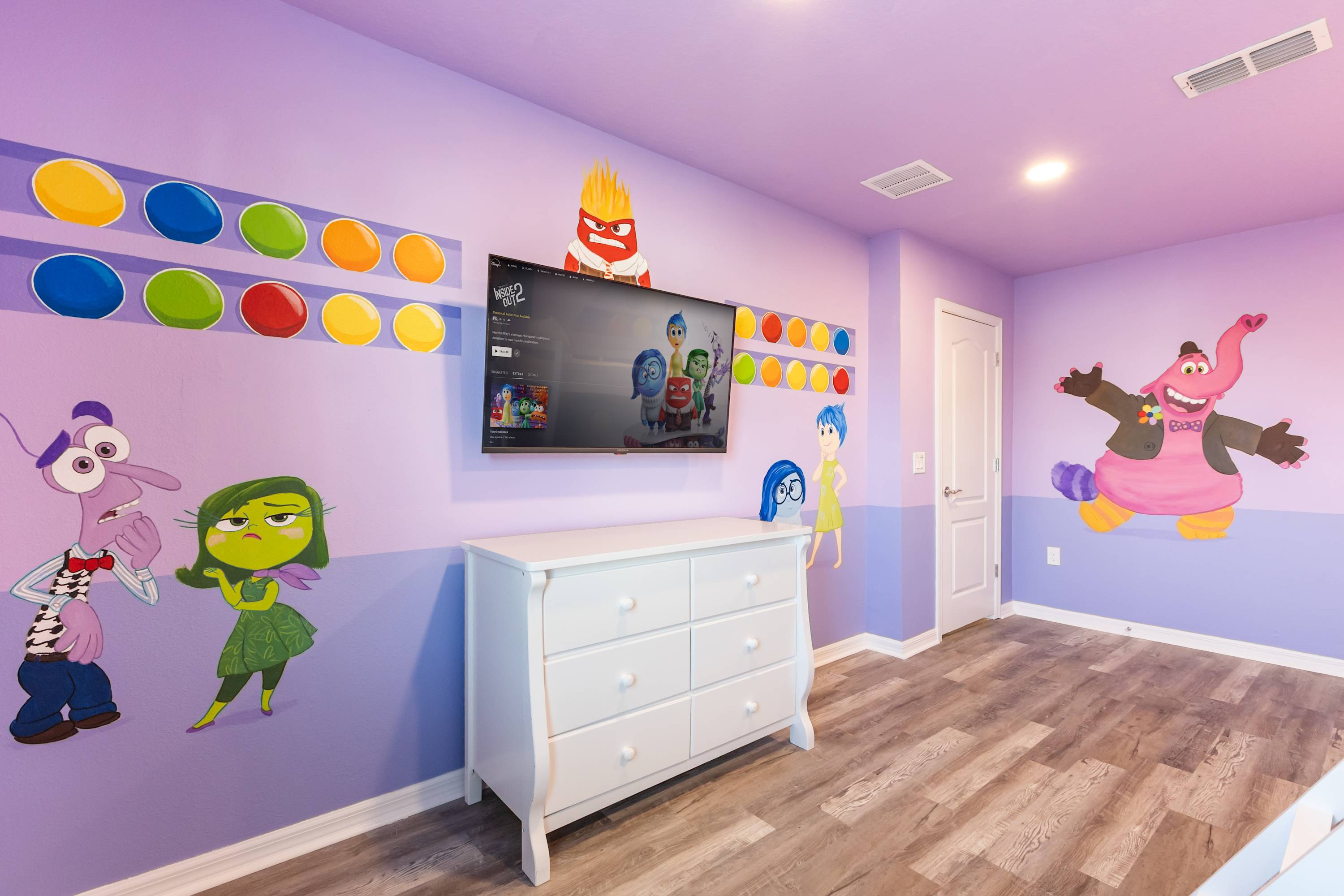 Bedroom 3 – Disney inside-out themed bunk room with two twin bunk beds—perfect for kids or groups.