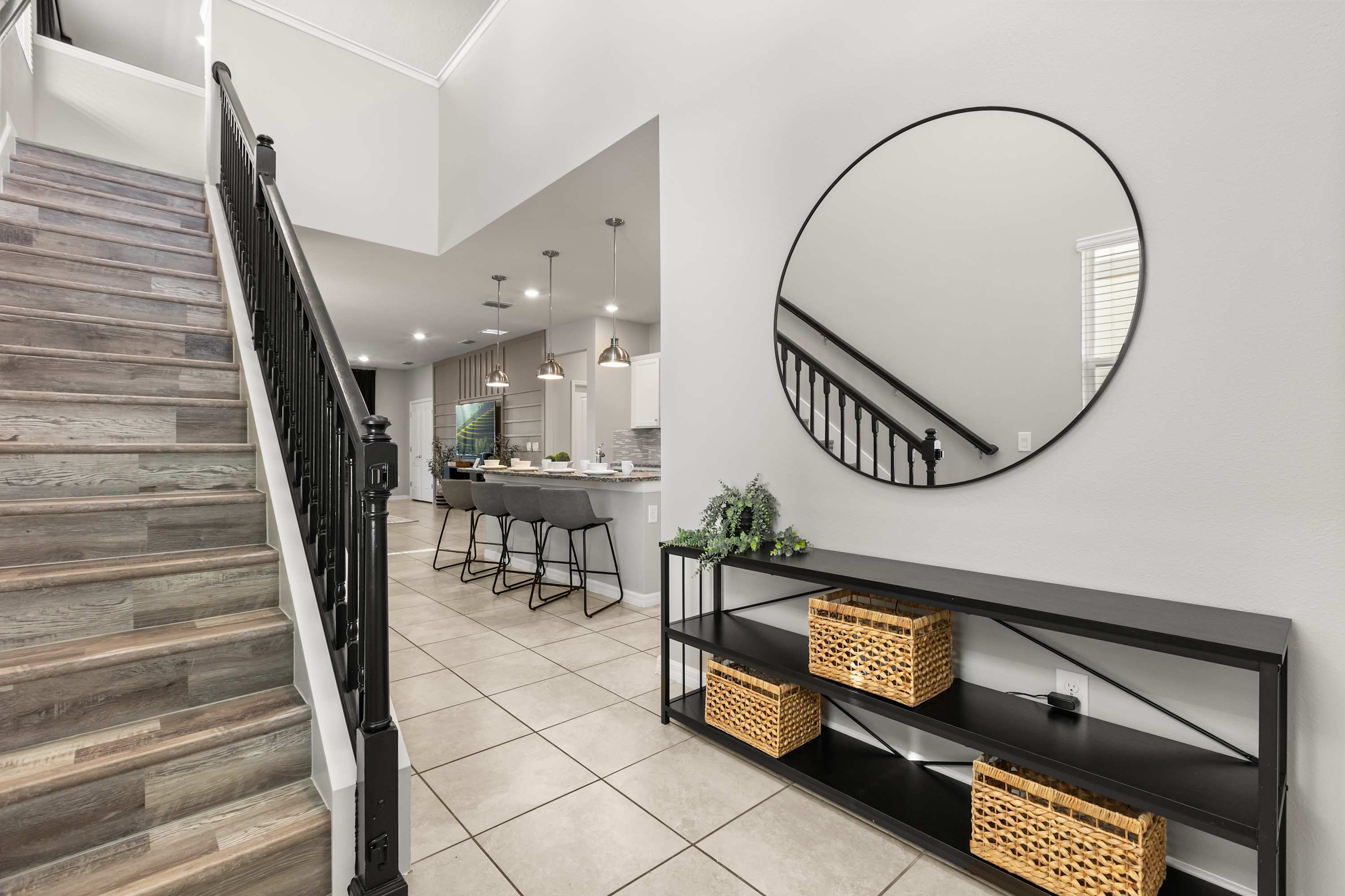 Interior hallway and stairs leading upstairs