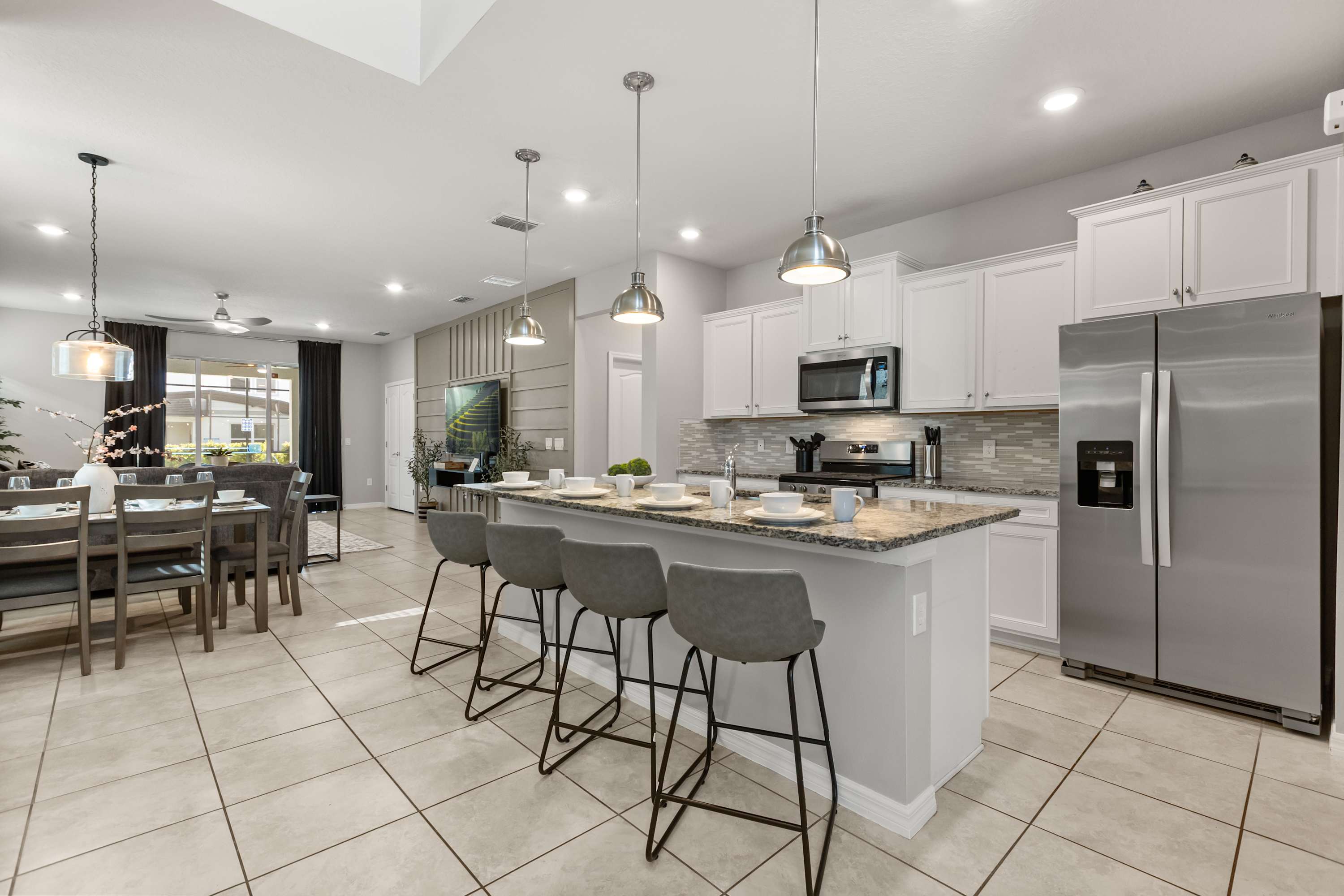 Kitchen - Fully stocked kitchen features modern appliances, generous counter space, and all the essentials for cooking at home.