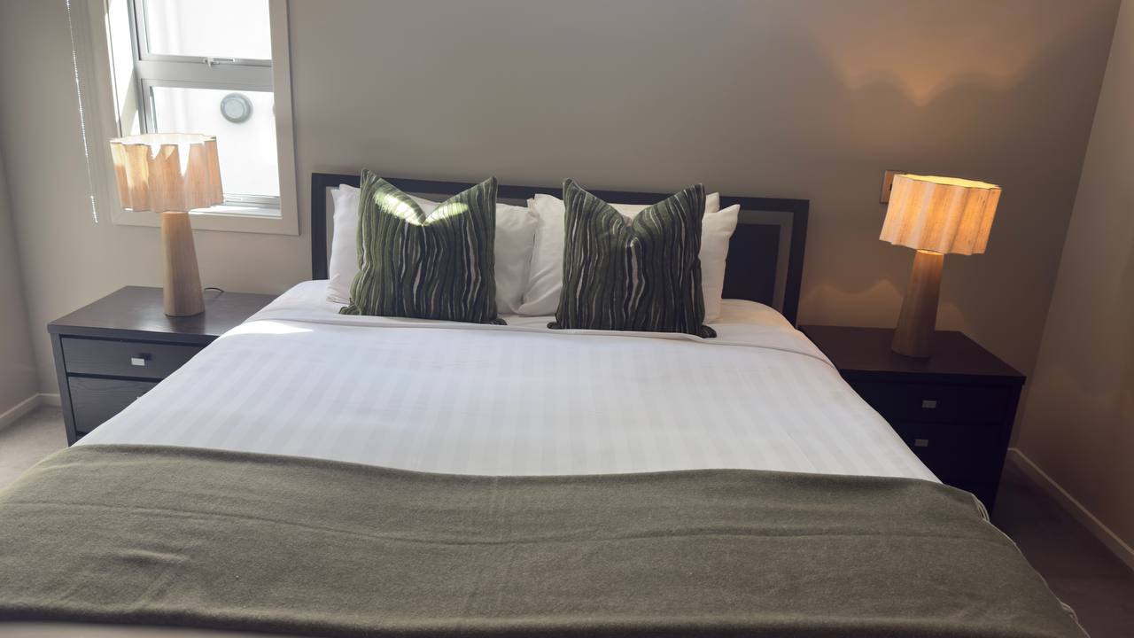 Bedroom 2 set up as a king bed.