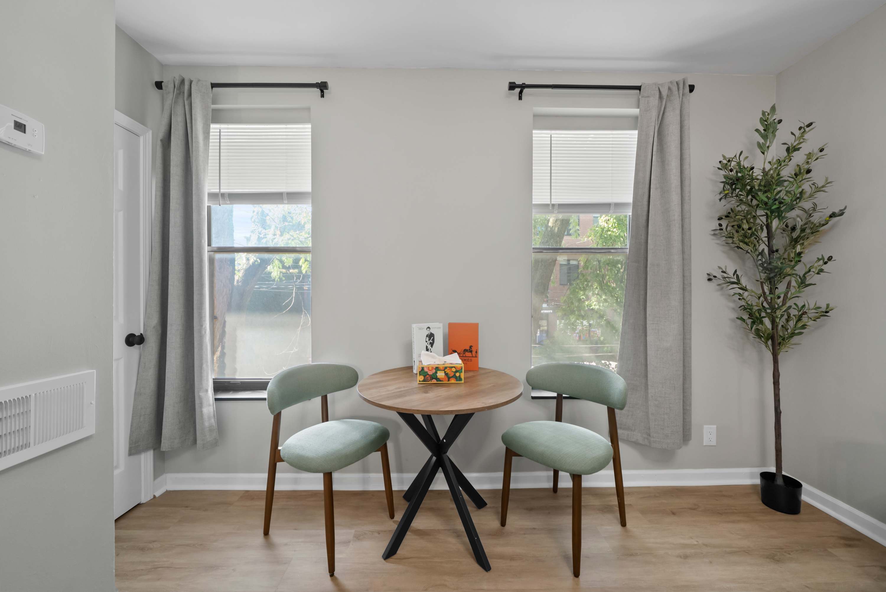 Sip morning coffee or enjoy a bite at the cozy dining table, with space for 2​