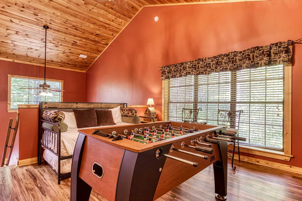 Foosball area and loft bedroom
