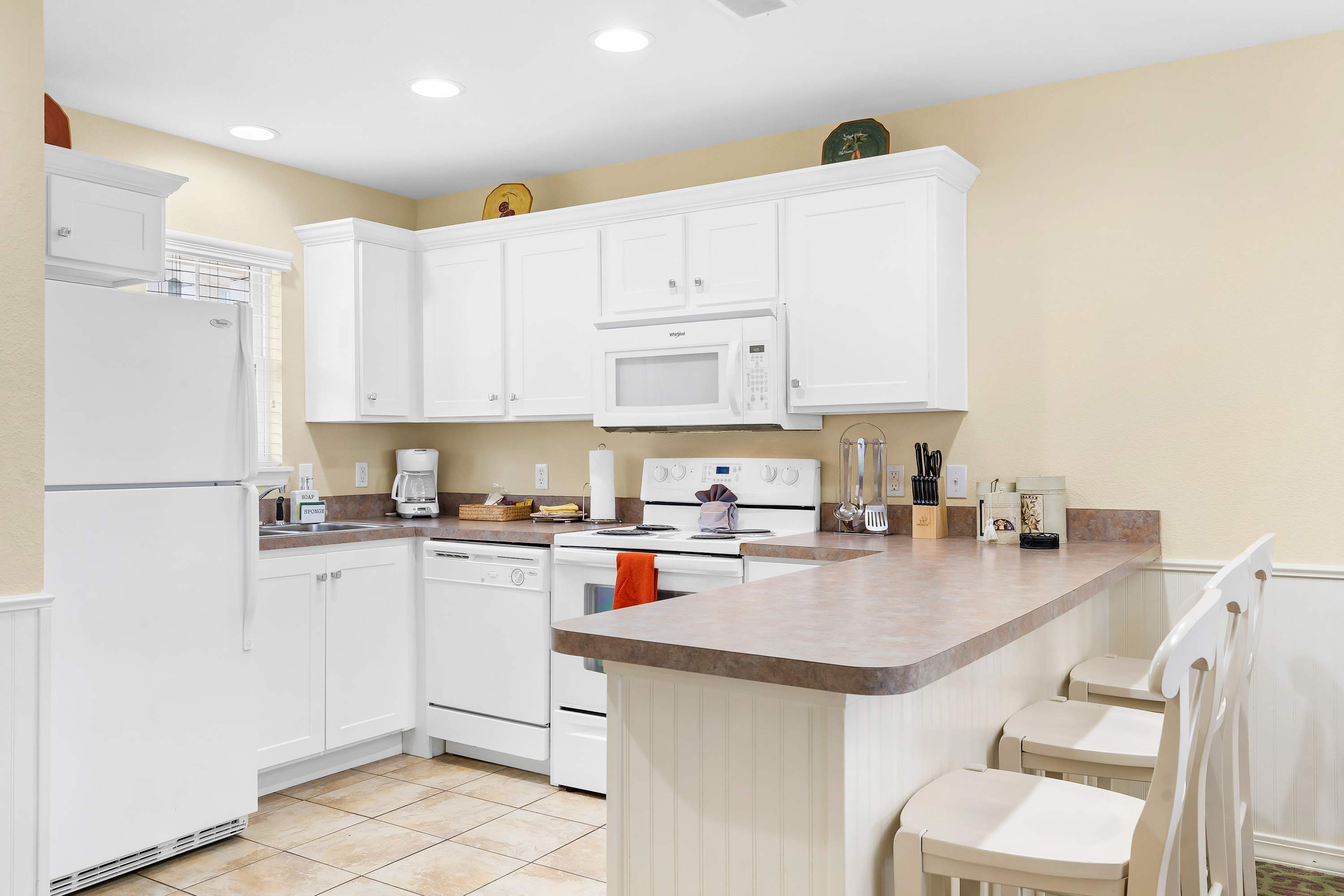 The open, airy kitchen is well equipped for an unforgettable getaway​