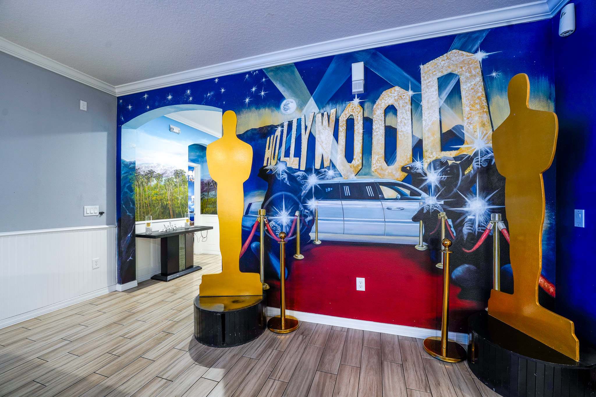 Step into Hollywood glamour with this stunning themed room, perfect for movie lovers and star-studded gatherings.