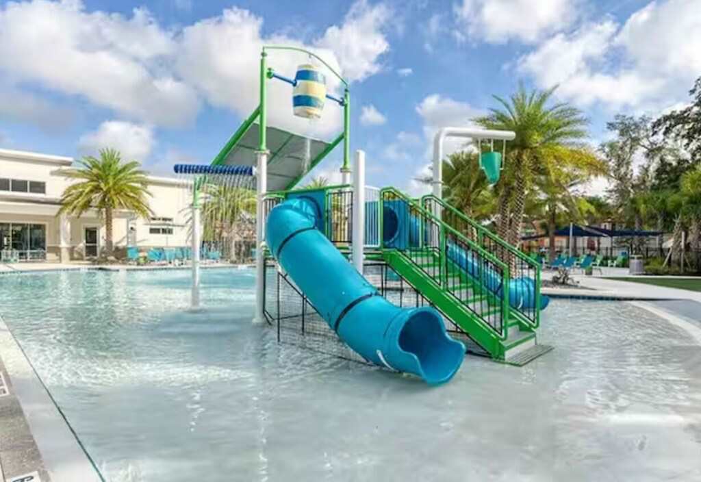 Enjoy endless fun at the vibrant pool with a thrilling water slide and splash features, perfect for family adventures.