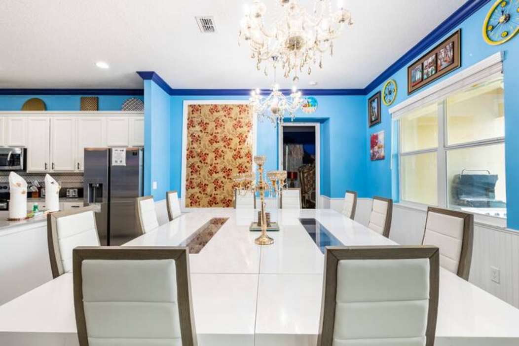 Elegant dining room with seating for ten, perfect for large gatherings and celebrations.