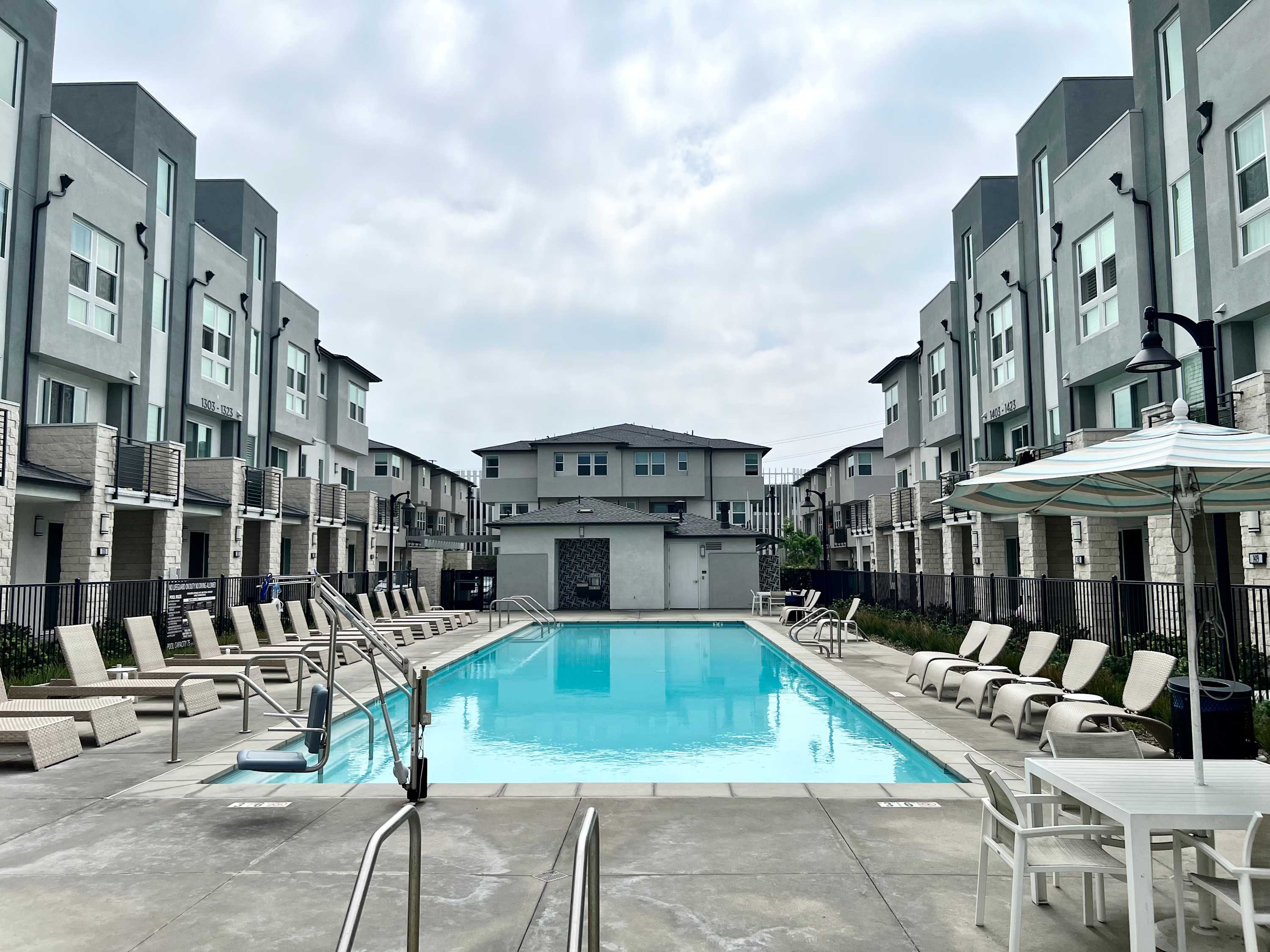 Community pool, a perfect spot for a refreshing dip and sunny vibes.