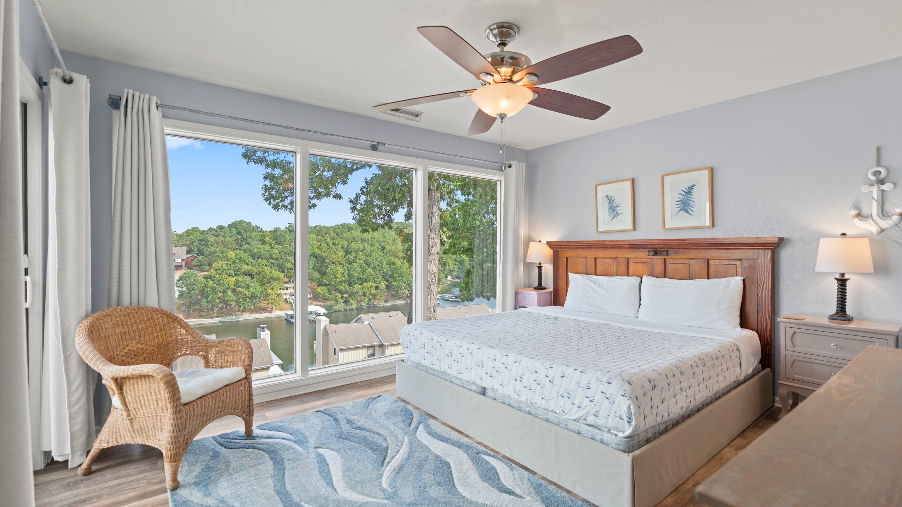 The primary king suite boasts great views, a smart TV, ensuite, & balcony access​