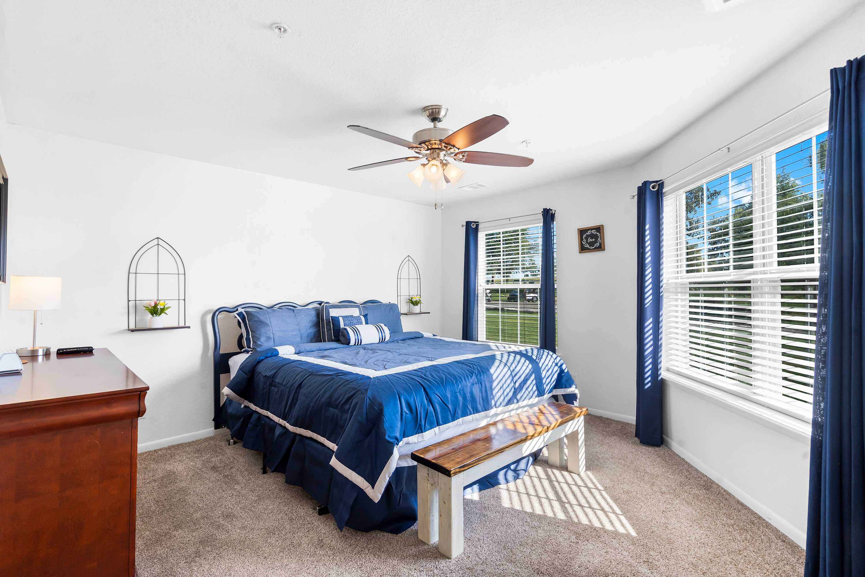 The primary king suite boasts a tv & private ensuite bath​