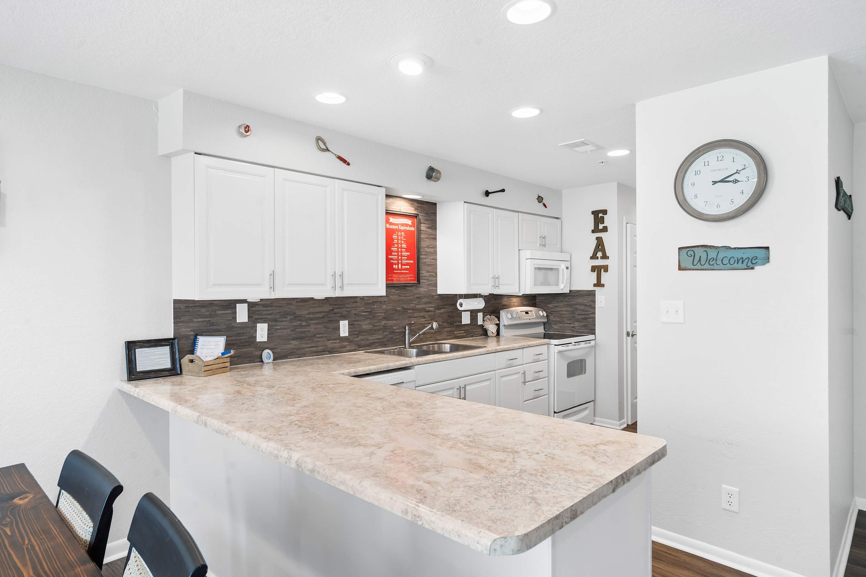 The open kitchen is well equipped for an unforgettable getaway​