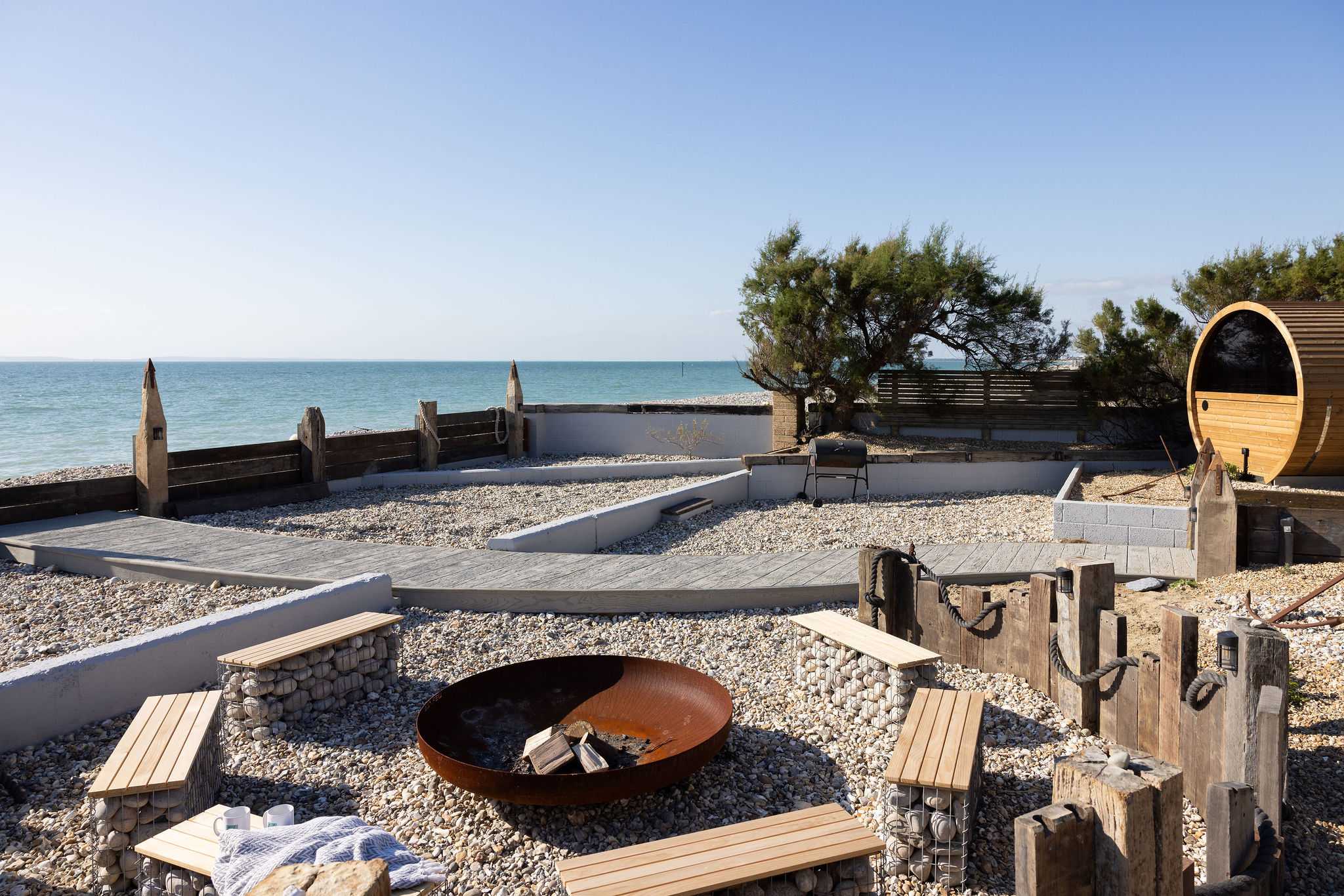 Gather round the fire pit as evening approaches to watch incredible sunsets while chatting with your loved ones.