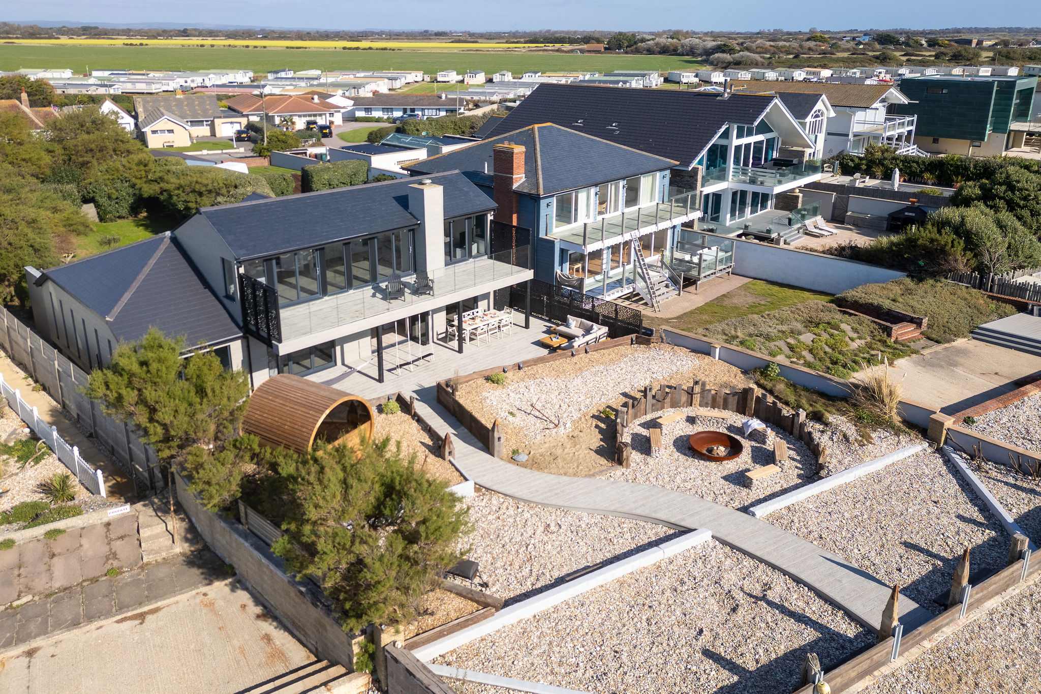 The recently landscaped seafront garden, thoughtfully designed to create different spaces to rest, eat, relax, and rejuvenate by the ocean.