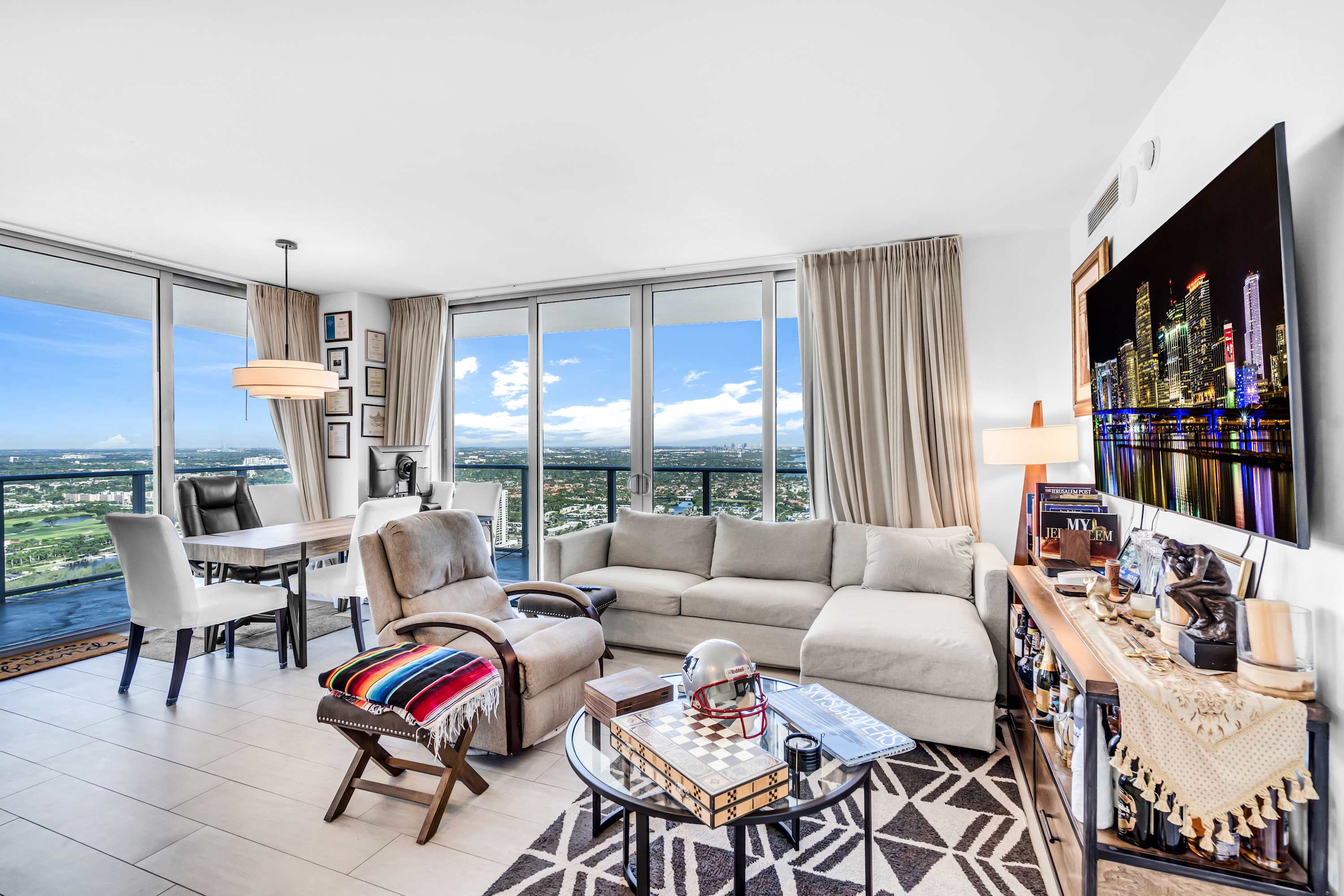 Bright living room with work station and Smart TV