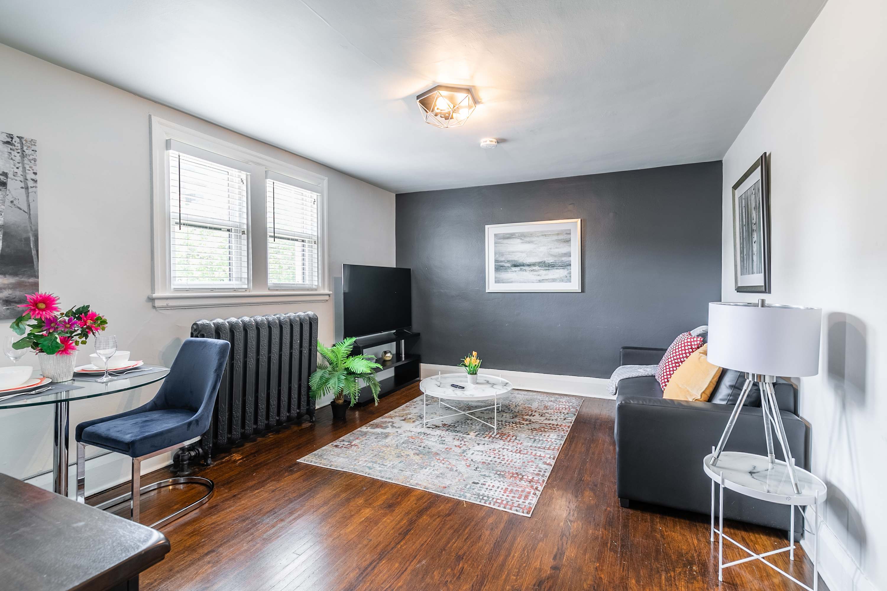 Spacious living room with smart TV and Sofa Bed
