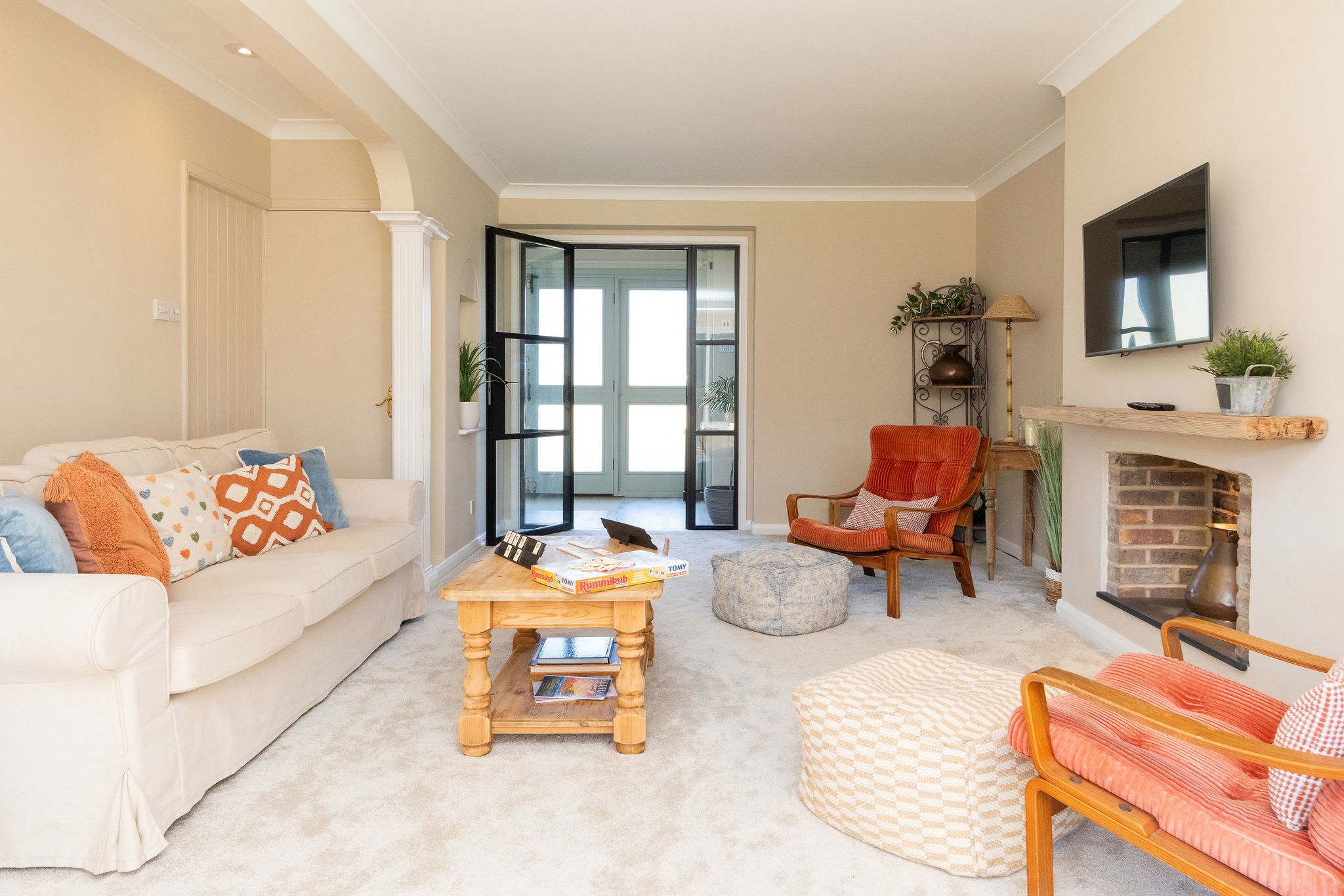 The cosy lounge is the perfect spot to unwind after a day exploring the coast.