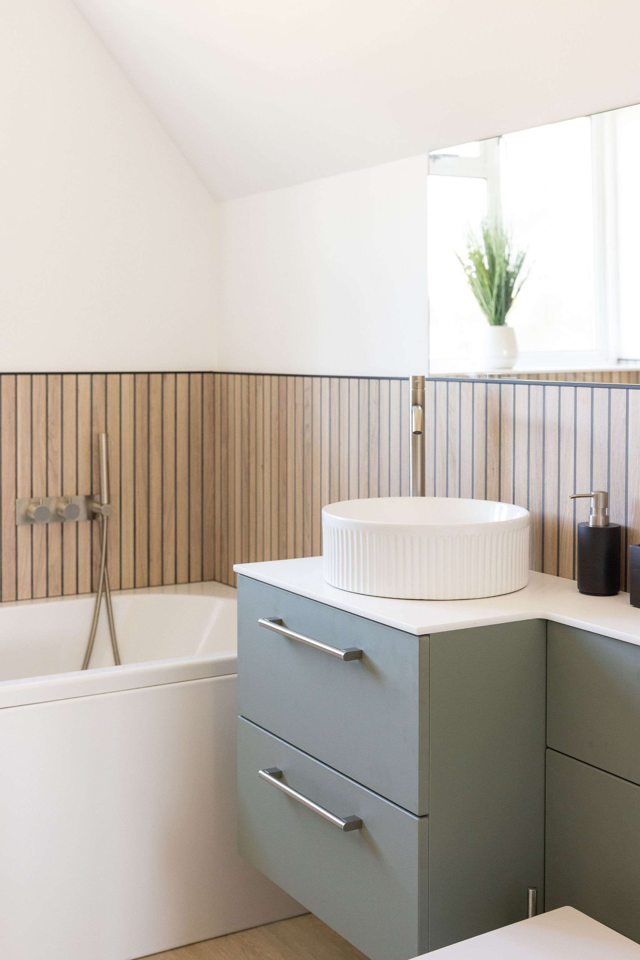 The vanity unit offers plenty of storage for your toiletries.