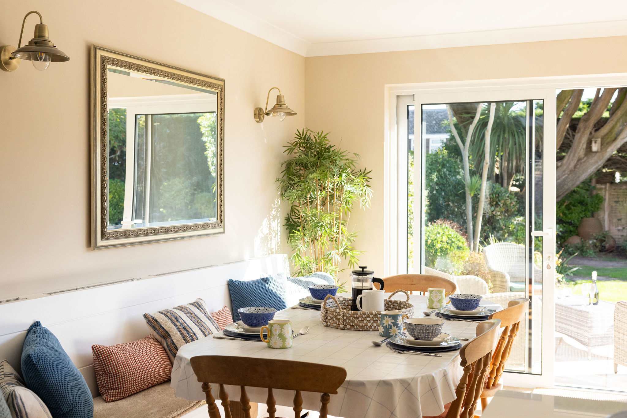 Open up the patio doors and allow the natural sunlight to flood in.