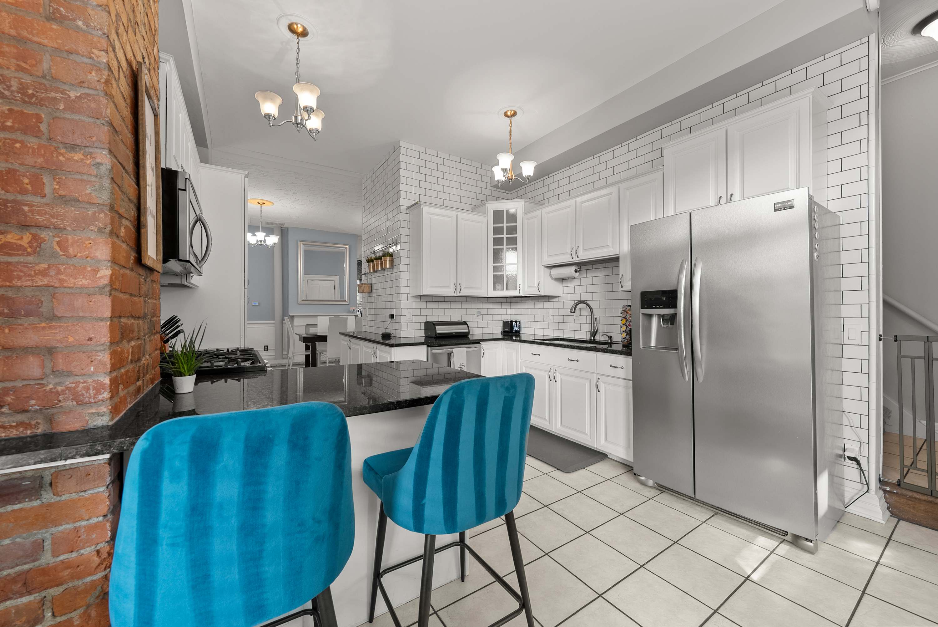 The updated kitchen offers ample space & all the comforts of home​