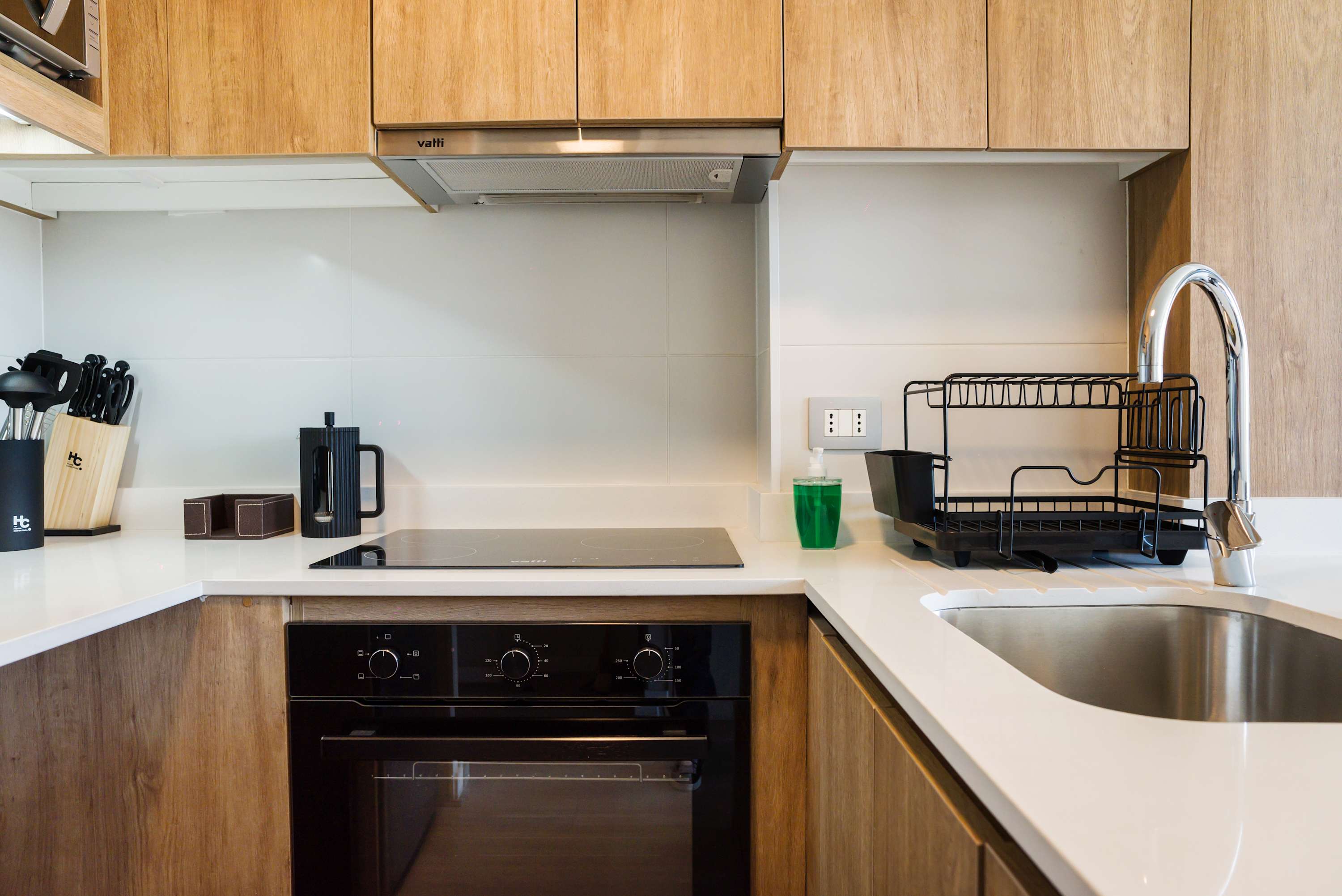 Modern kitchen with sleek appliances and essentials for a comfortable stay.
