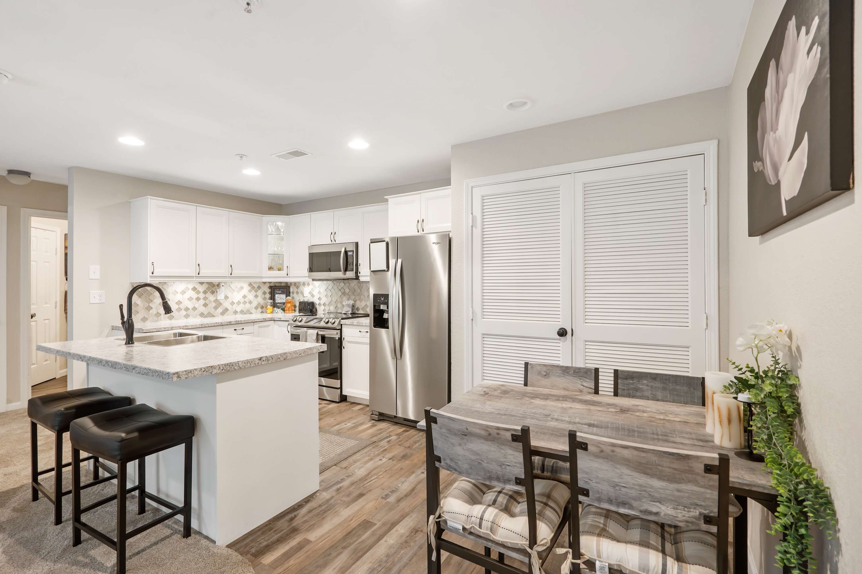 The open, airy kitchen offers ample space & all the comforts of home​