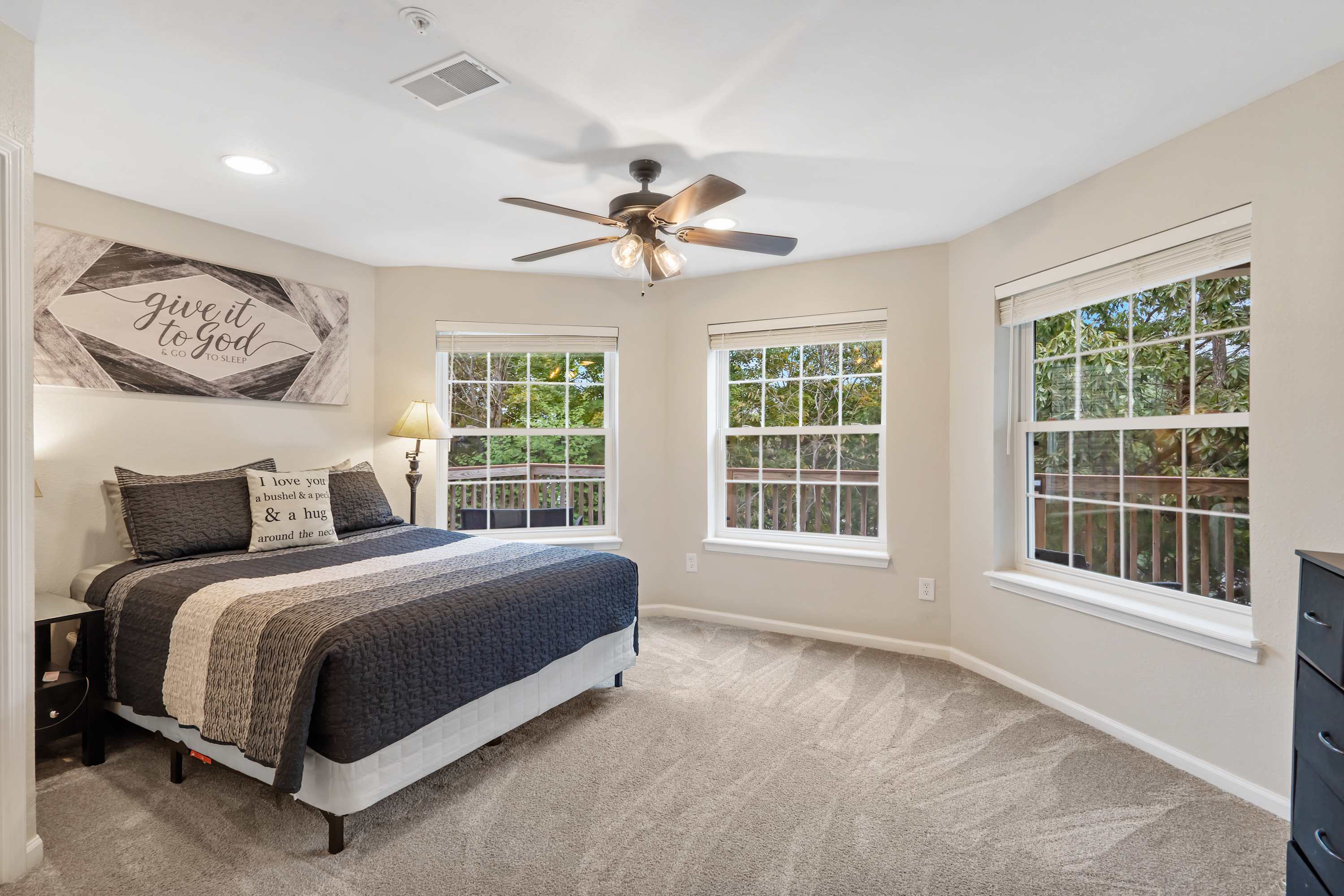 The primary queen suite boasts a smart TV & ensuite bath​