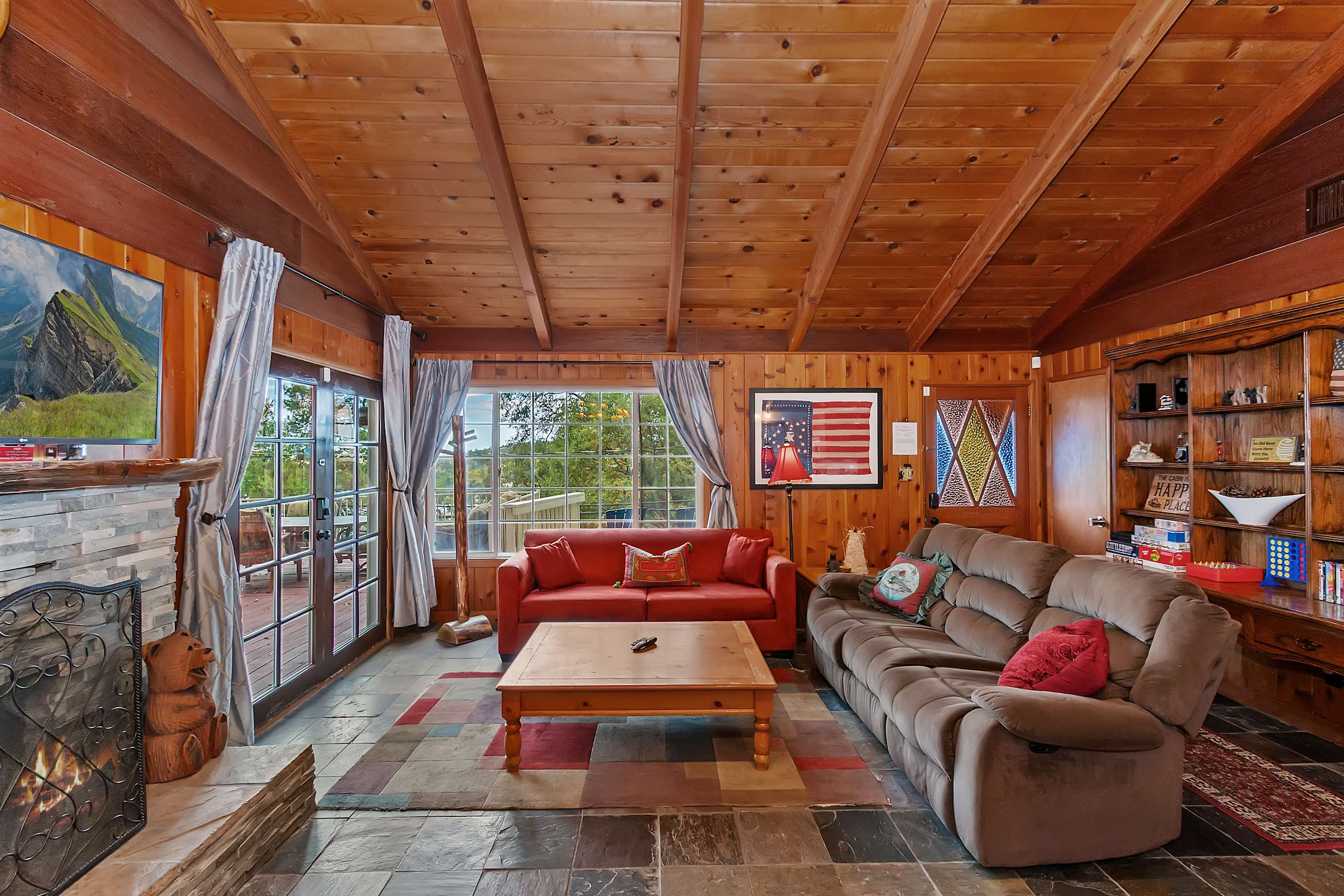 Open-concept living—queen sleeper, fireplace, and stunning views! 