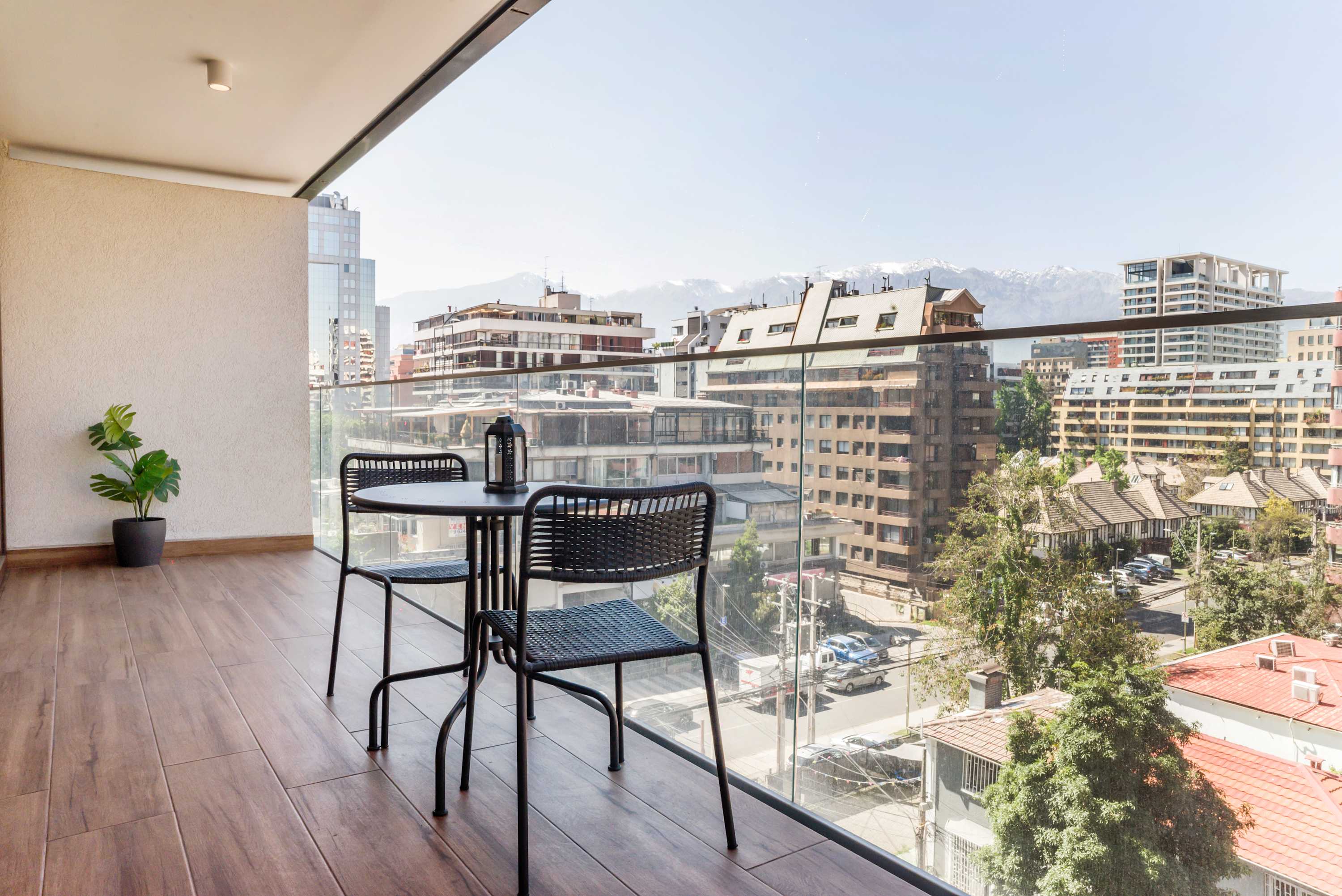 Enjoy breathtaking city and mountain views from your private balcony, perfect for relaxing with a morning coffee or evening drink.