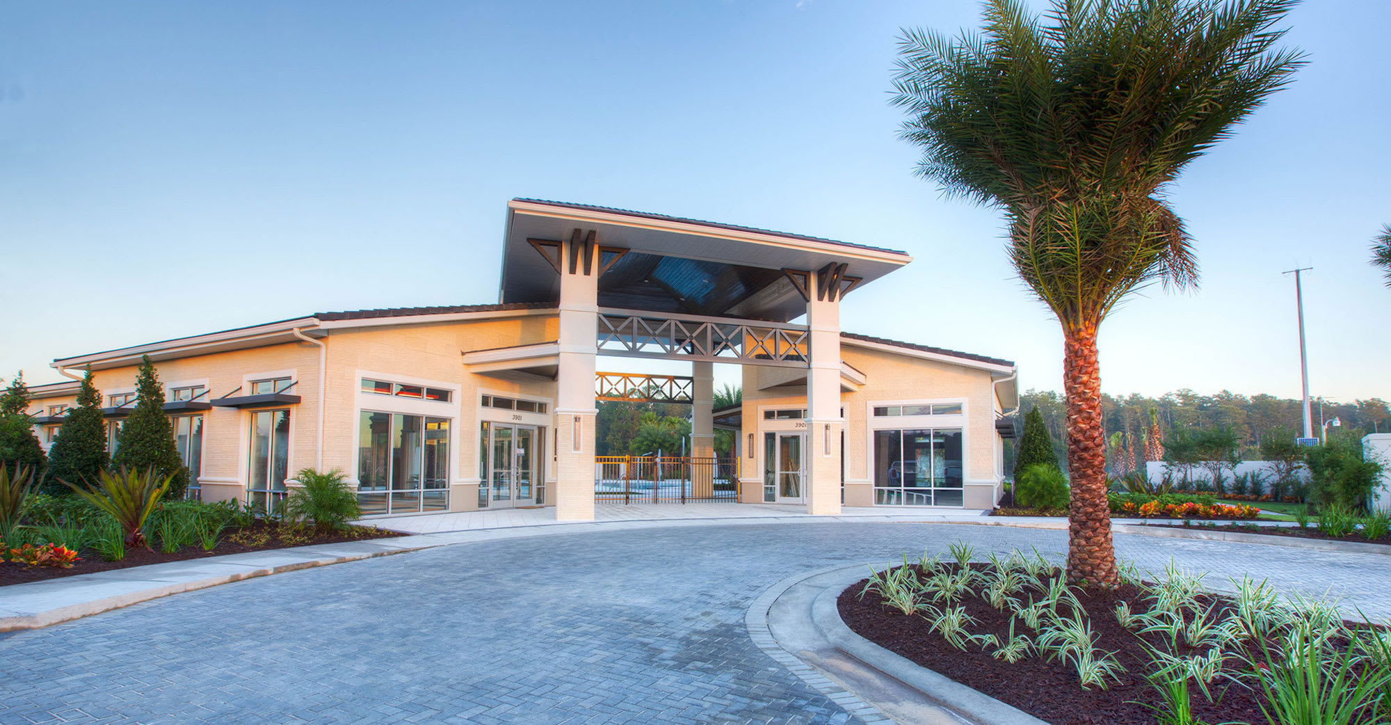 Resort Clubhouse Entrance: Grand resort-style clubhouse offering guest check-in, lounge space, and everyday vacation vibes.