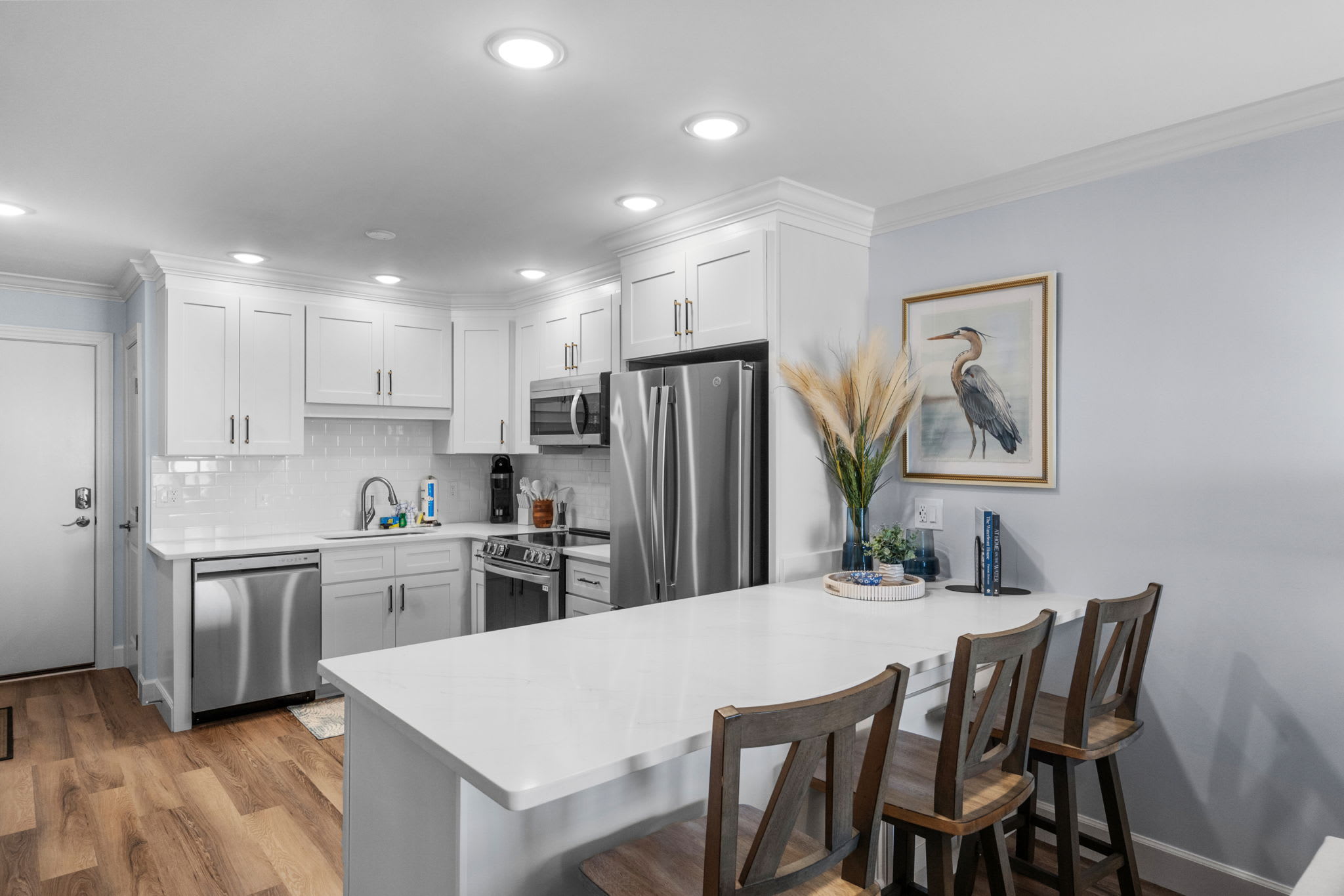 Kitchen with island seating for 3