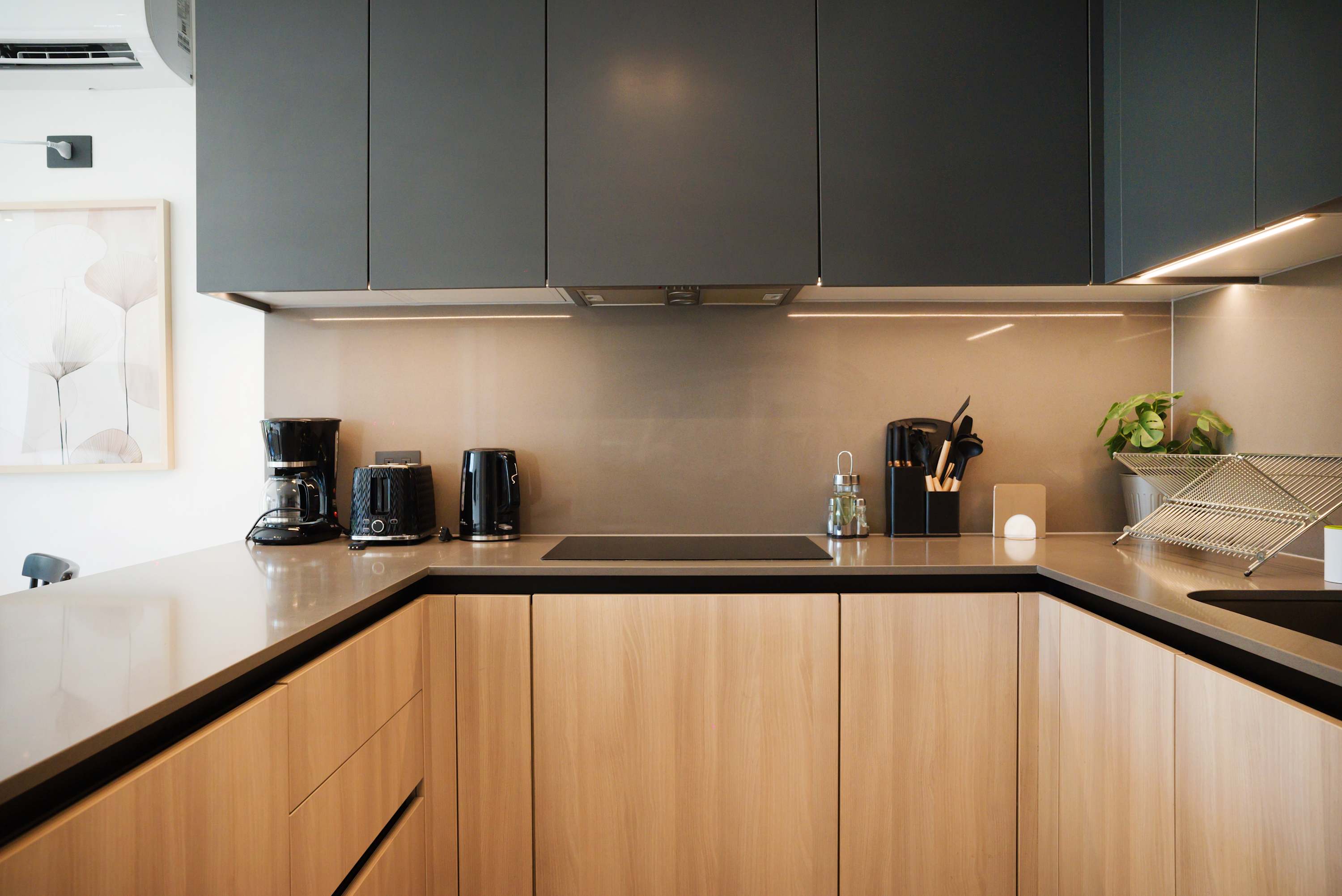 Stylish kitchen with modern appliances and ample counter space, perfect for culinary adventures.