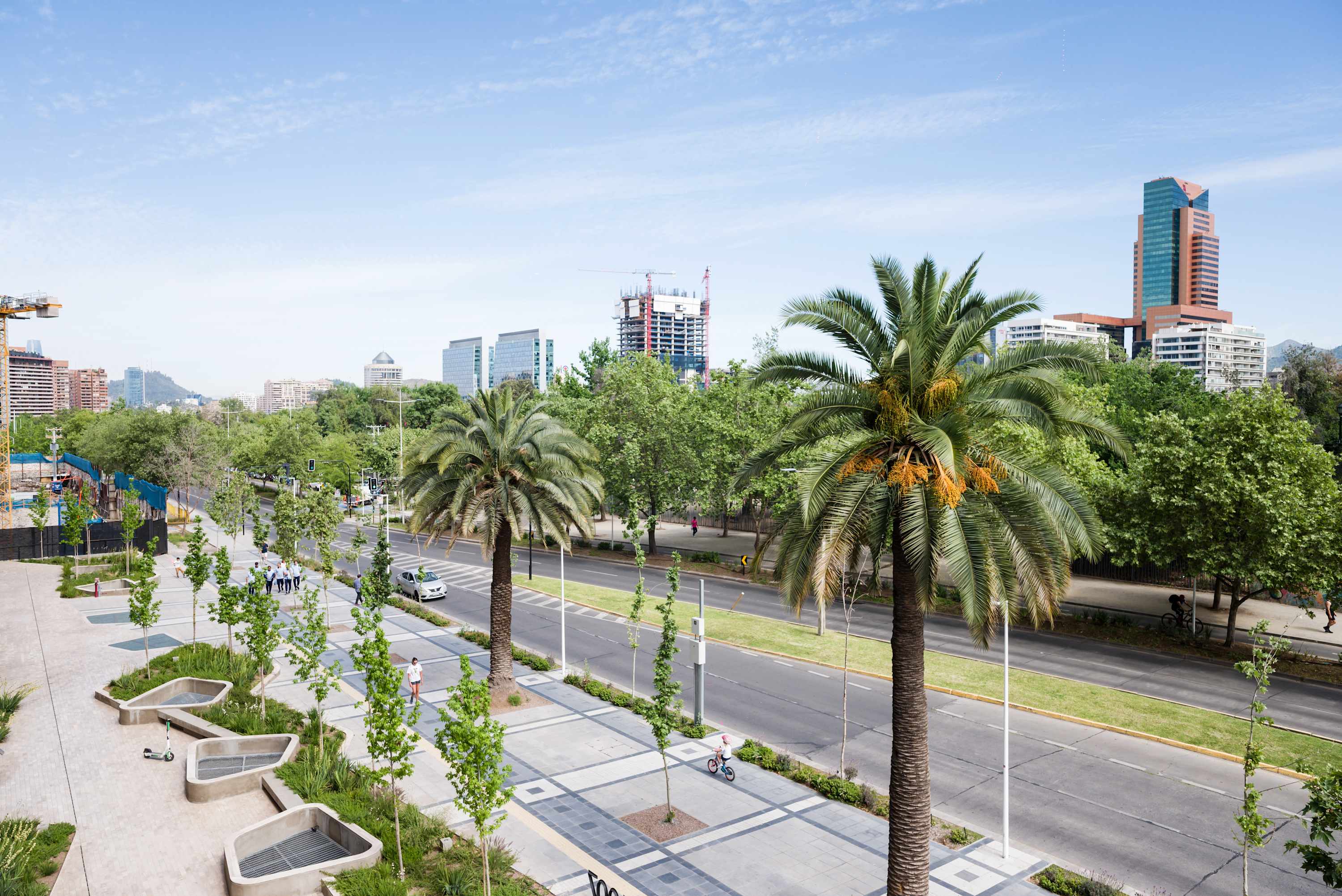 Enjoy stunning city views with lush greenery and modern architecture from your apartment in the heart of Chile.