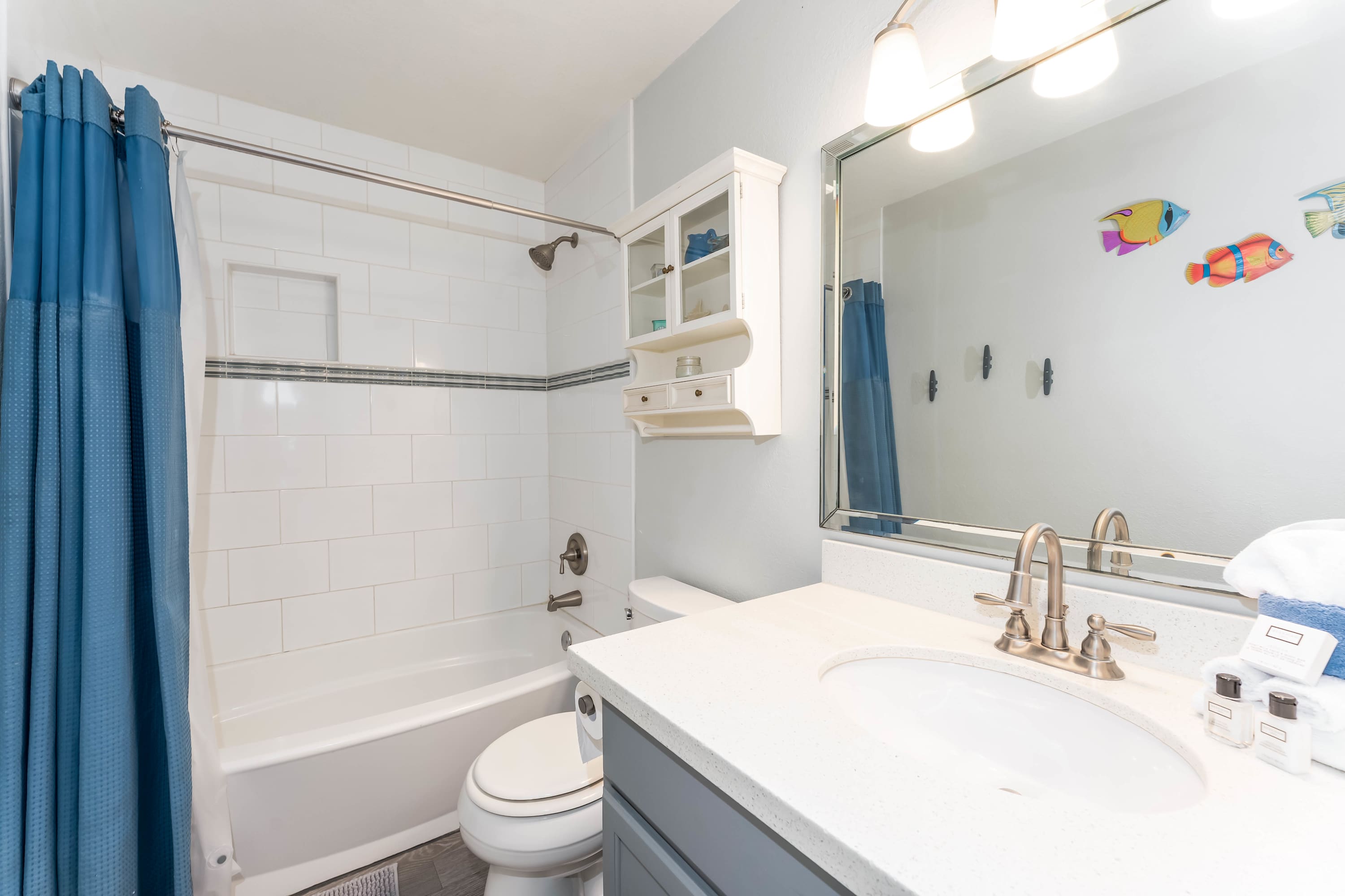 Second Bathroom — Clean and convenient, with a shower and vanity located near the lower-level bedrooms.