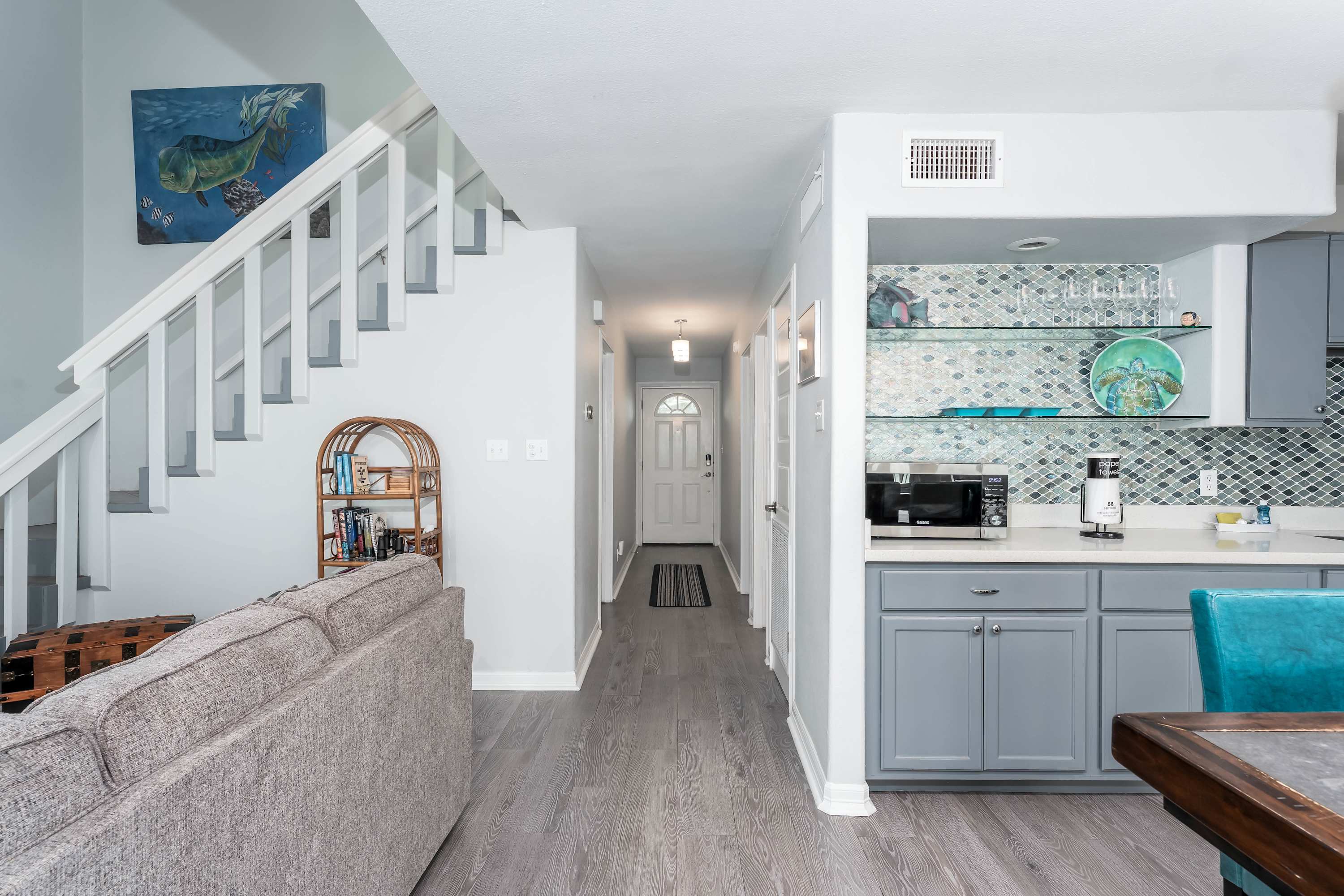 Open Living & Dining Space — A seamless flow between the lounge, dining, and kitchen areas—perfect for gathering and entertaining.