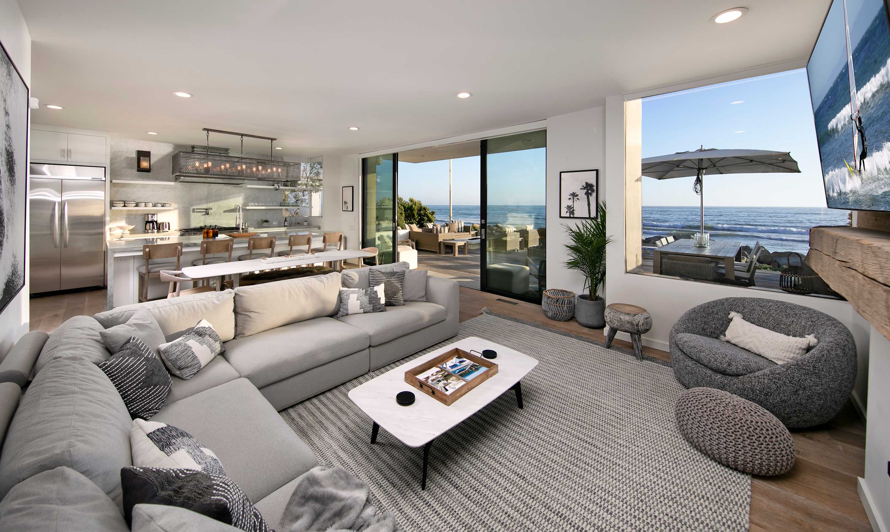 Soak in ocean views from the spacious living room with deck access 