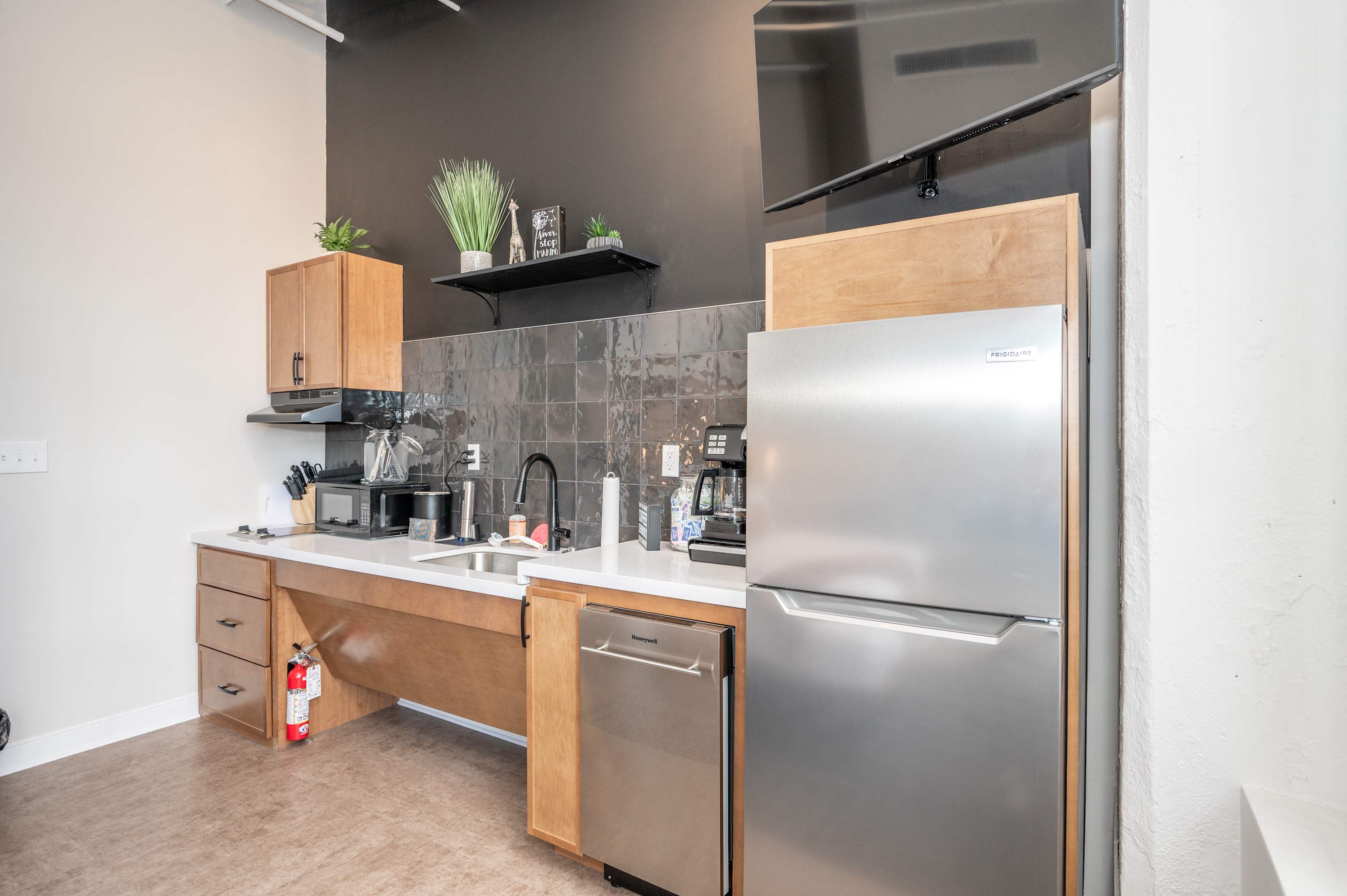 The sleek, open kitchen is well equipped for an unforgettable getaway​