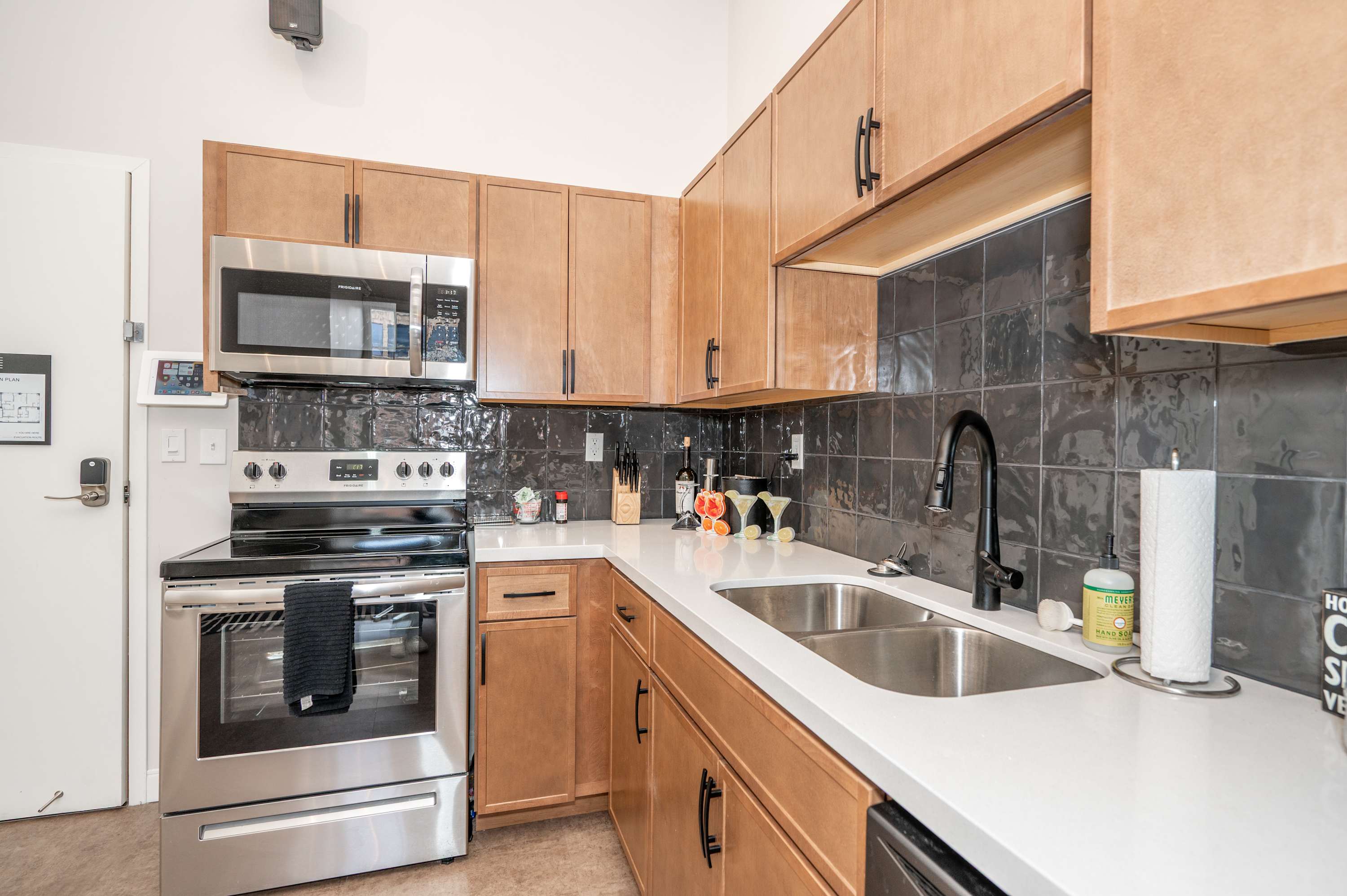 The sleek, open kitchen is well equipped for an unforgettable getaway​
