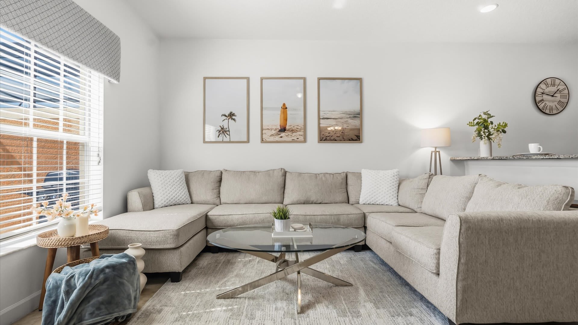 Open-Plan Living Area: Spacious and inviting lounge with comfortable sofas, a flat-screen TV, and plenty of natural light.
