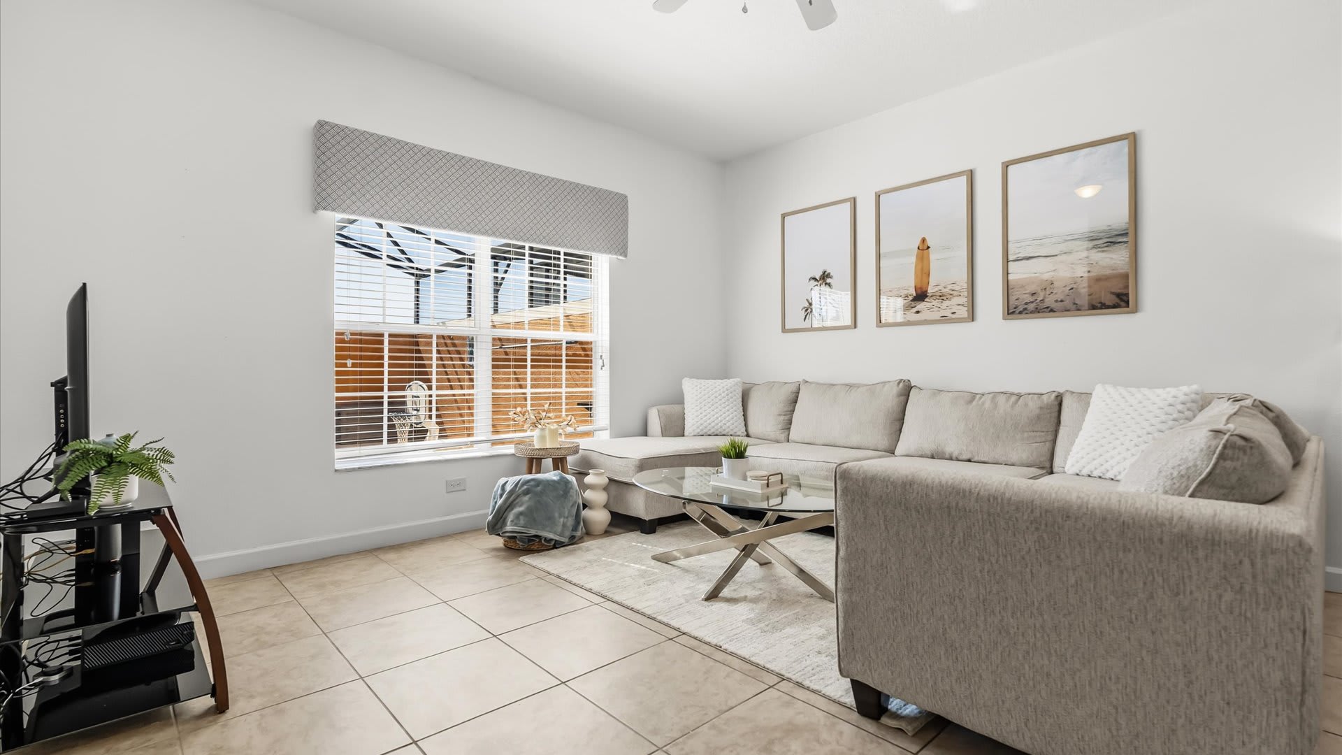 Open-Plan Living Area: Spacious and inviting lounge with comfortable sofas, a flat-screen TV, and plenty of natural light.