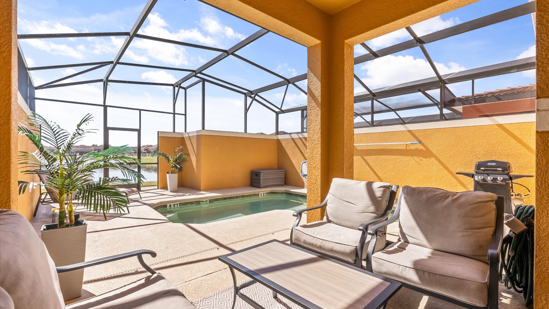 Covered Patio Lounge: Relax in the shaded outdoor seating area with comfy chairs and tranquil views.