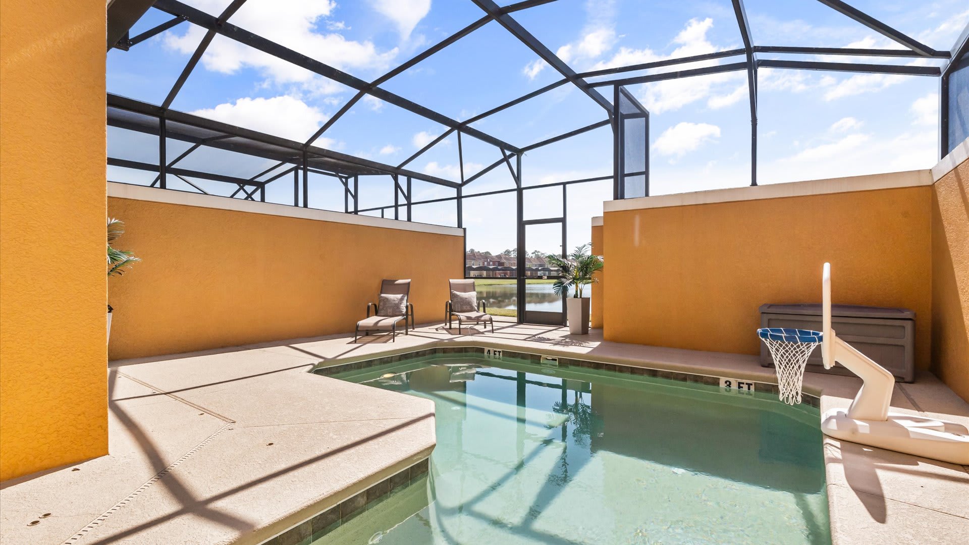 Outdoor Swimming Pool: Enjoy your own screened-in splash pool — perfect for cooling off after a day of adventure.