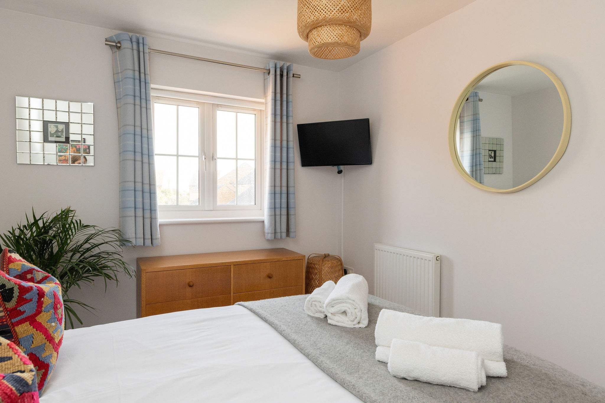 Relax in the bright and stylish bedroom.