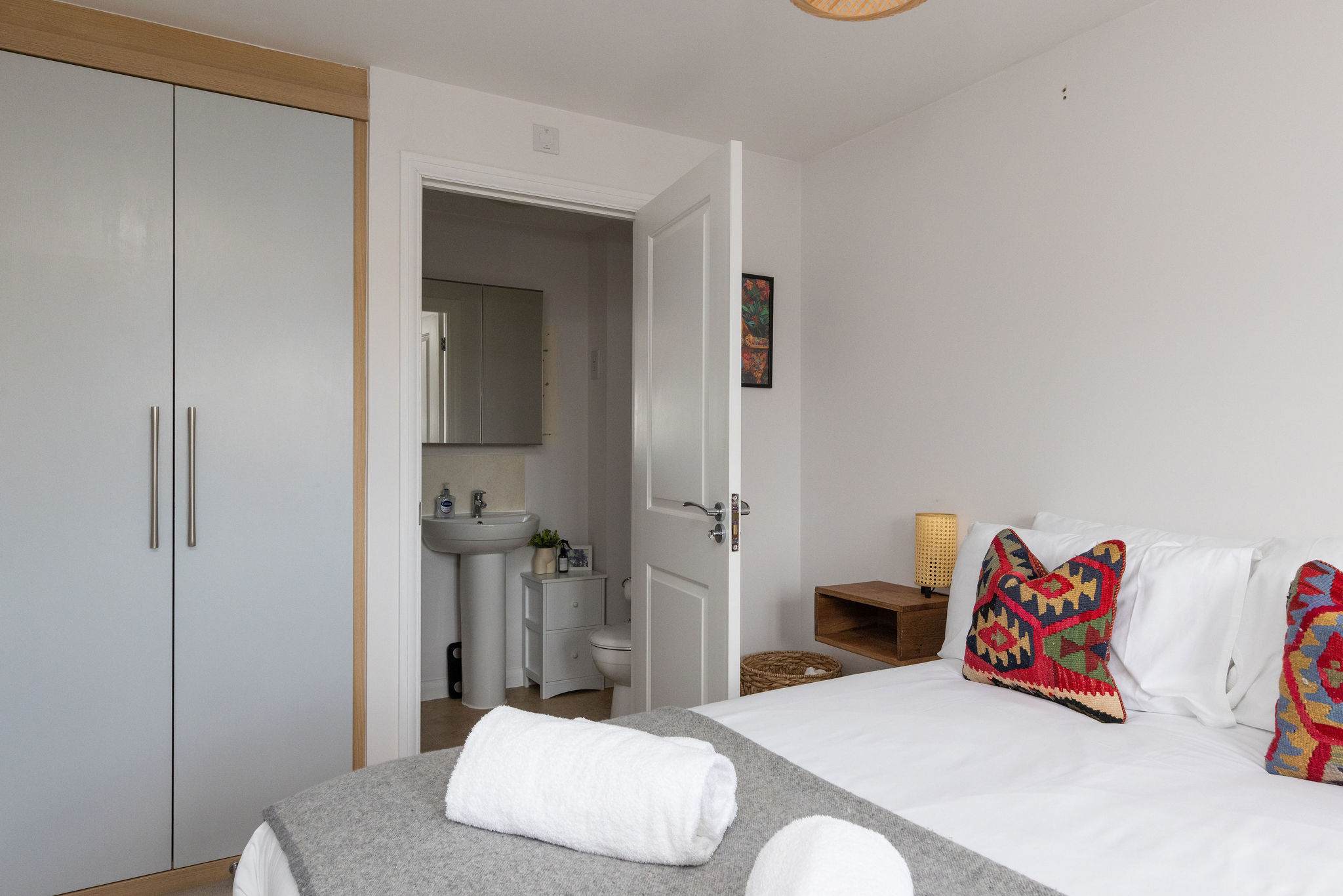 Master bedroom with wardrobe and private ensuite.