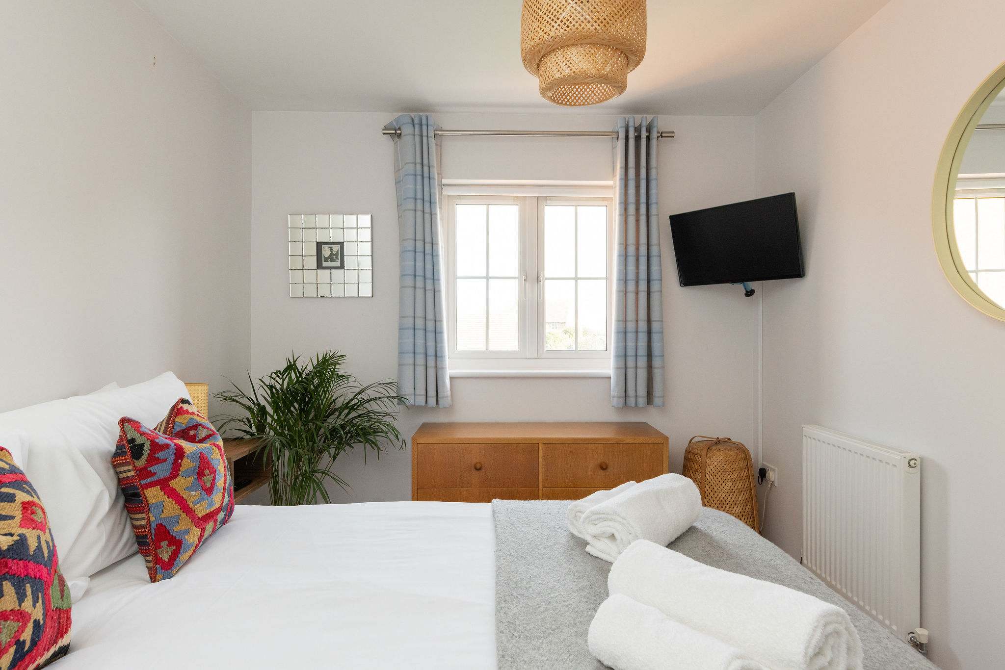 A restful double bedroom with its own TV.