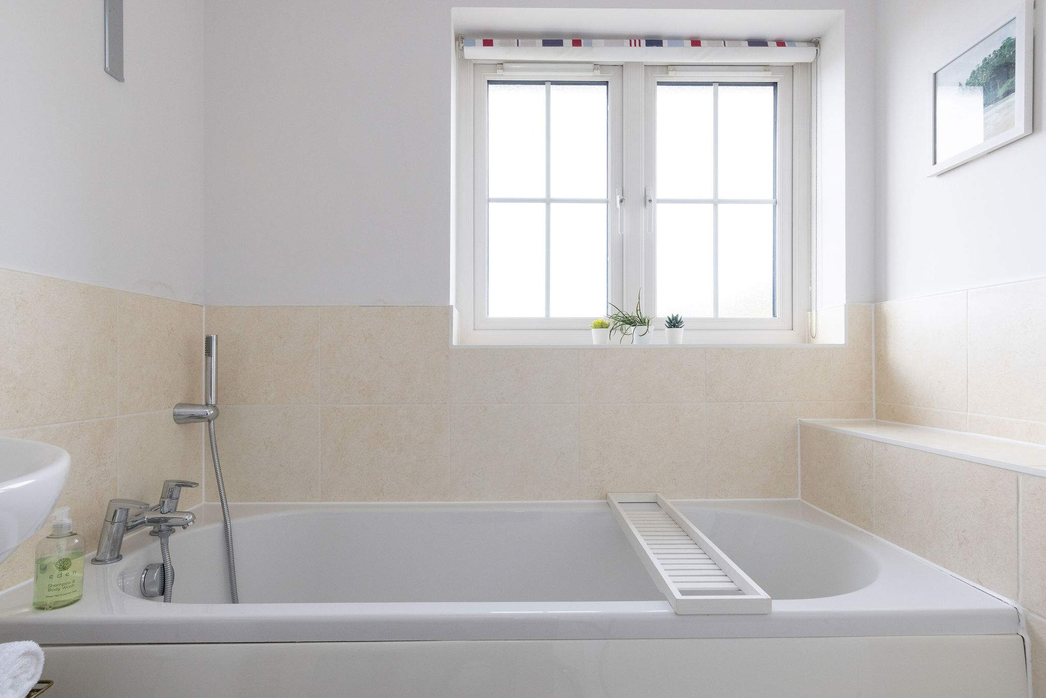 Unwind in the full-sized bath after a day exploring the area or at the beach.