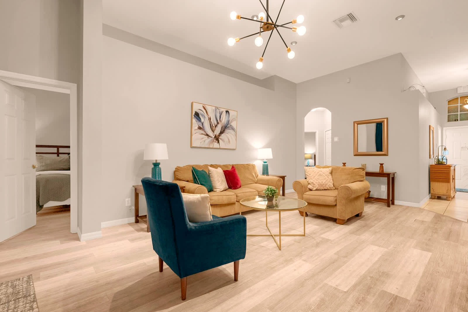 Relax in this stylish living room featuring cozy seating and modern decor, perfect for unwinding after a day of exploring.