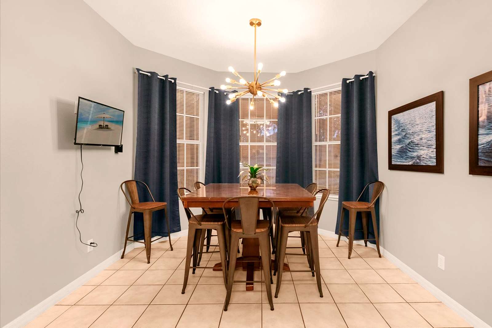 Elegant dining area with seating for eight, perfect for family meals and gatherings.