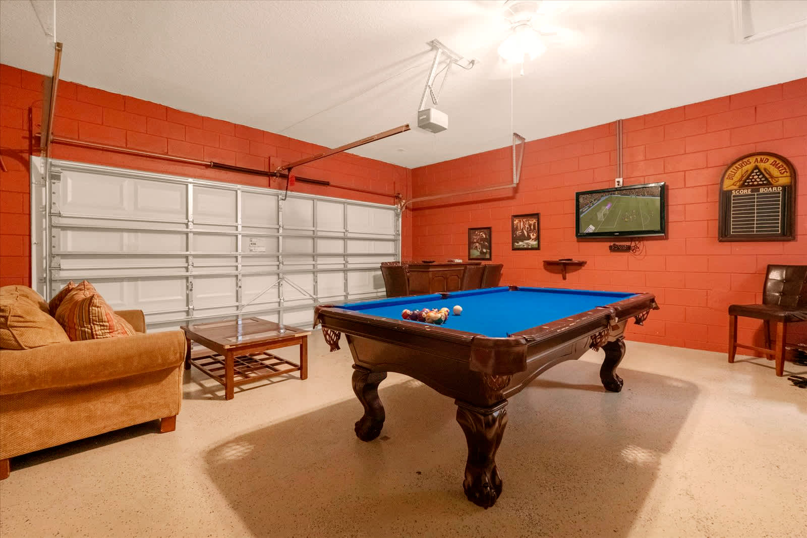 Enjoy a fun-filled evening in your private game room with a pool table and TV entertainment.