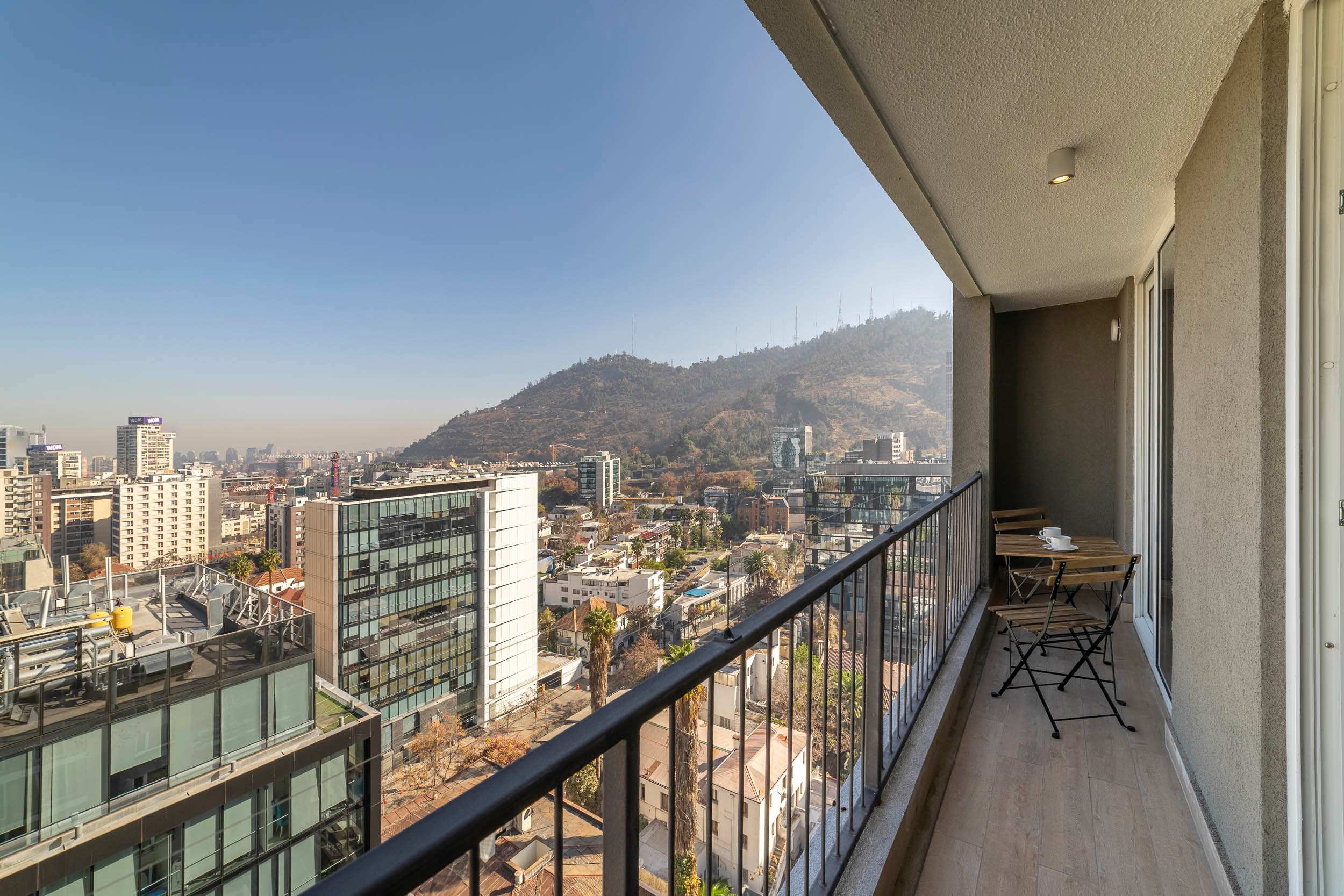 Enjoy breathtaking city and mountain views from your private balcony, perfect for morning coffee or evening relaxation.