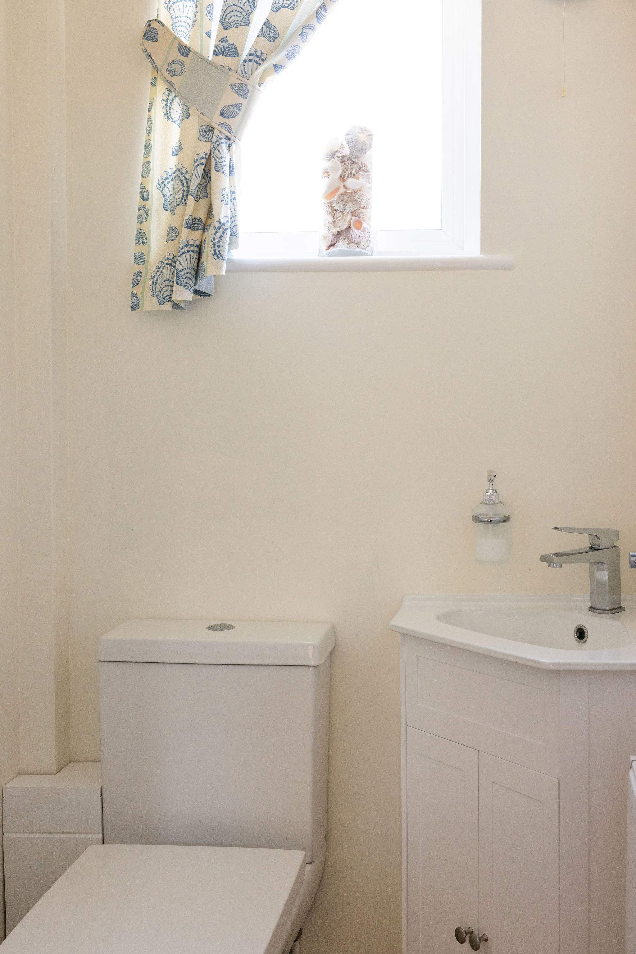 The home has a handy downstairs cloakroom.